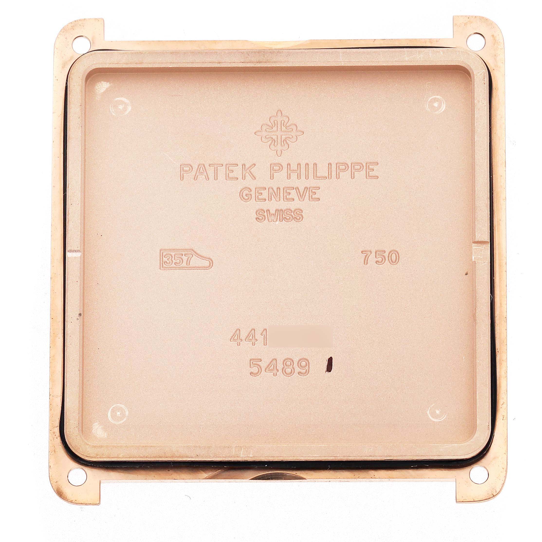 The image shows the back case of a Patek Philippe Gondolo 5489R Men
s Rose Gold Silver Dial 5489R Men
s Rose Gold Silver Dial watch, featuring inscriptions and branding details.