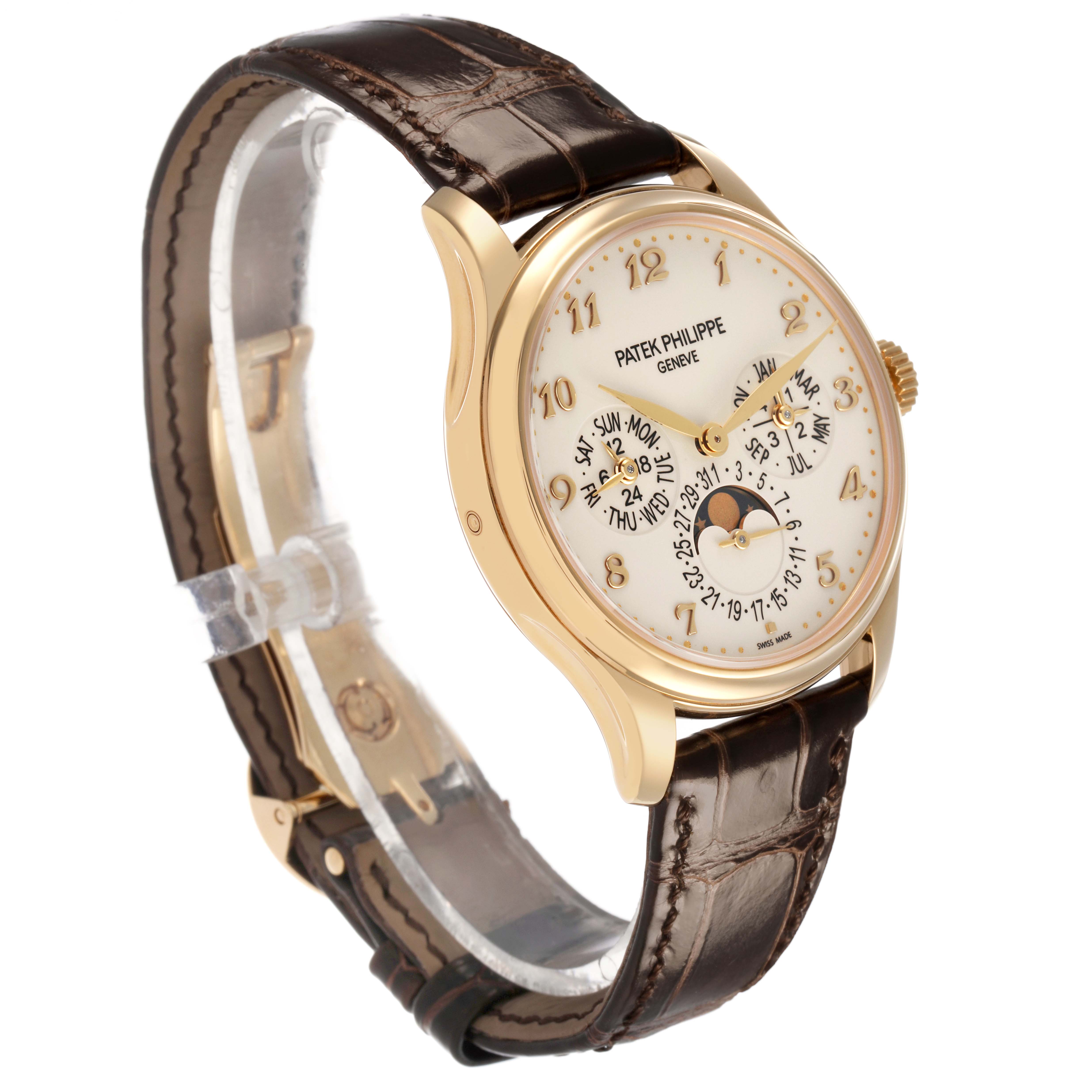 The Patek Philippe Complications 5327J-001 Men's Yellow Gold Beige Dial watch is shown at a three-quarter angle, highlighting the face, bezel, and brown leather strap.