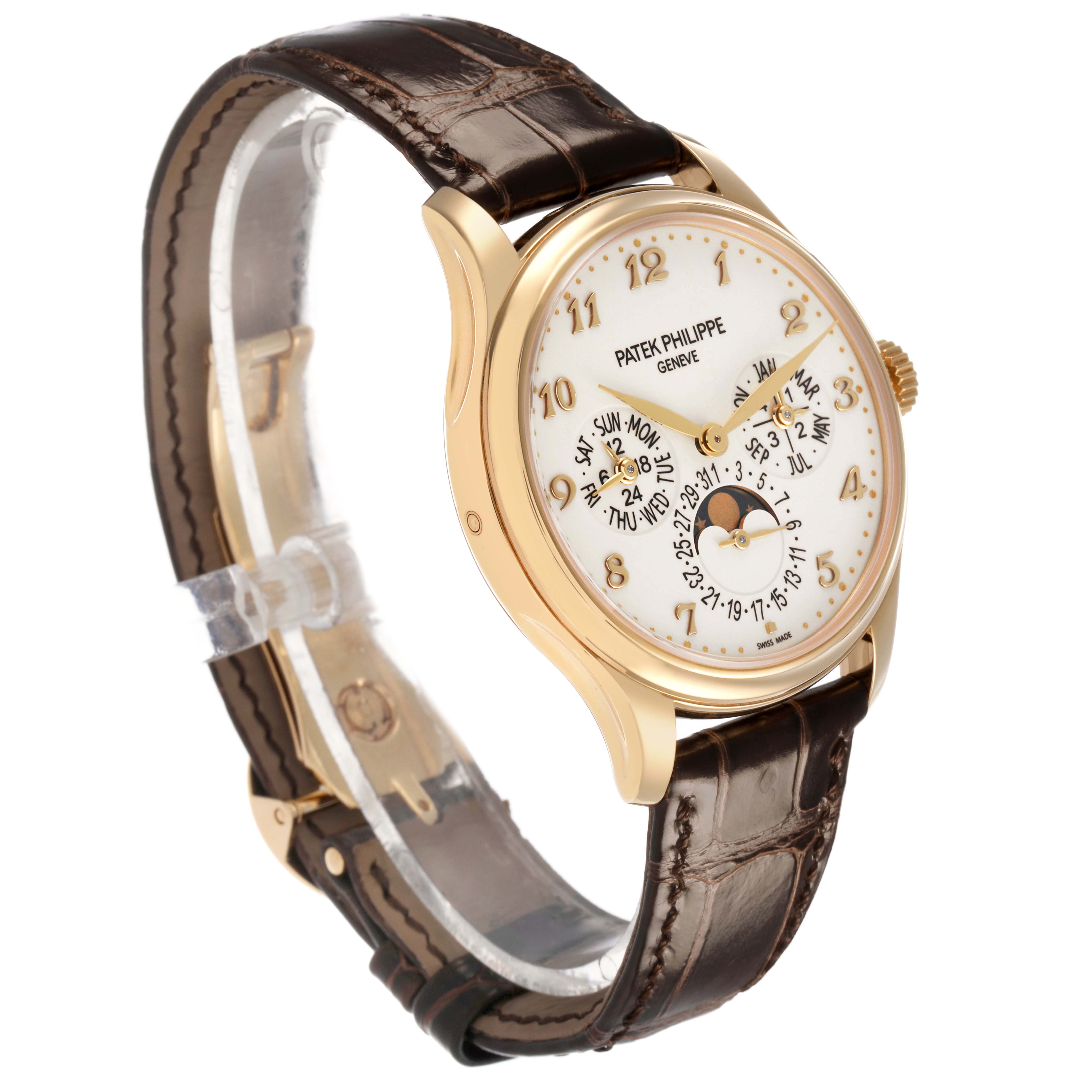 The Patek Philippe Complications 5327J-001 Men's Yellow Gold Beige Dial watch is shown at a three-quarter angle displaying the face, case, lugs, and strap.