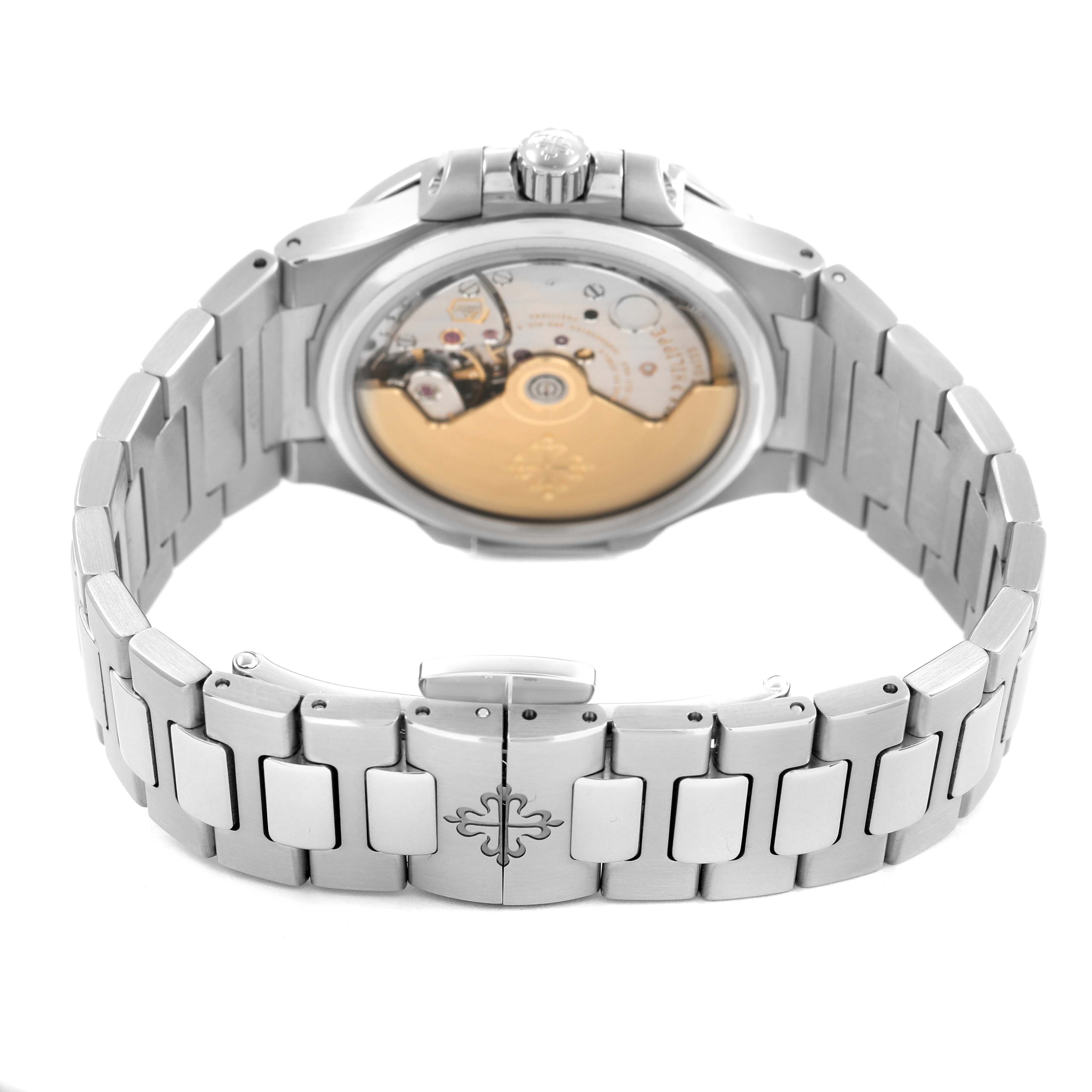 The image shows the back of a Patek Philippe Nautilus 7008/1A-011 Women's Stainless Steel Silver Dial, featuring the movement and bracelet with folding clasp.