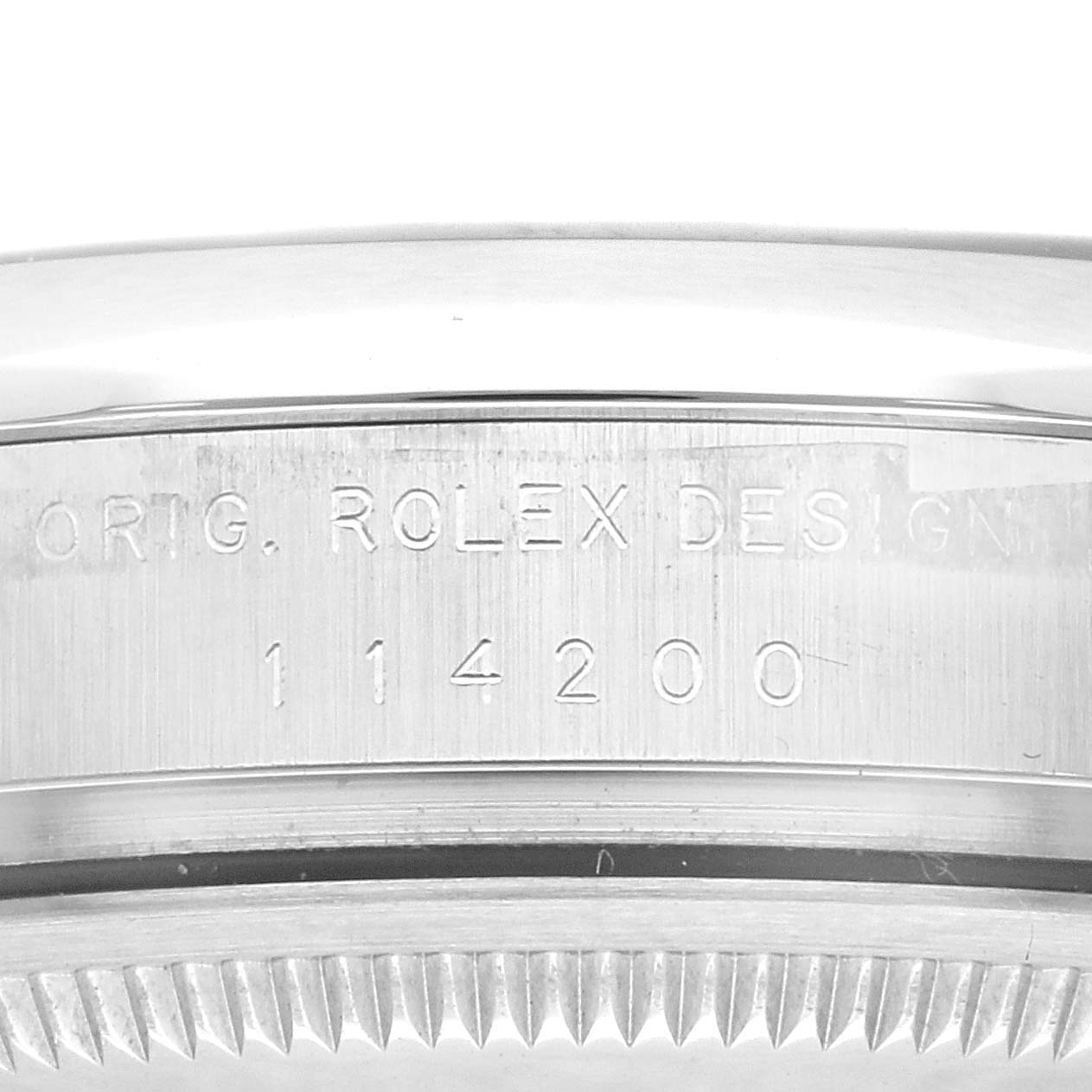 The image shows a close-up view of the case side, featuring the model number engraving of the Rolex Air-King 114200 Men's Stainless Steel Grey Dial 114200 Men's Stainless Steel Grey Dial.