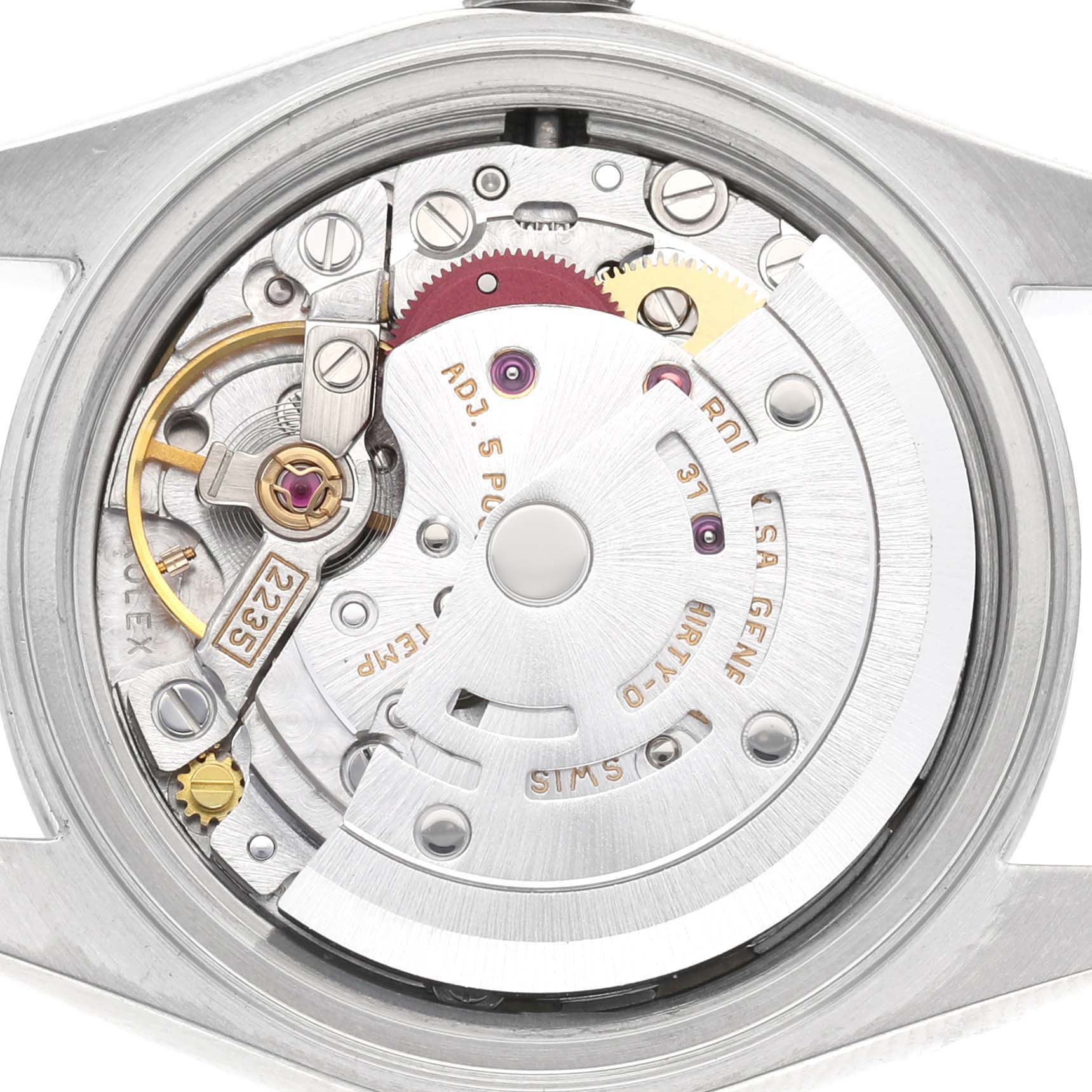 The image shows the movement of a Rolex Date 79160 Women's Stainless Steel Blue Dial model, highlighting gears and the rotor from a top-down angle.