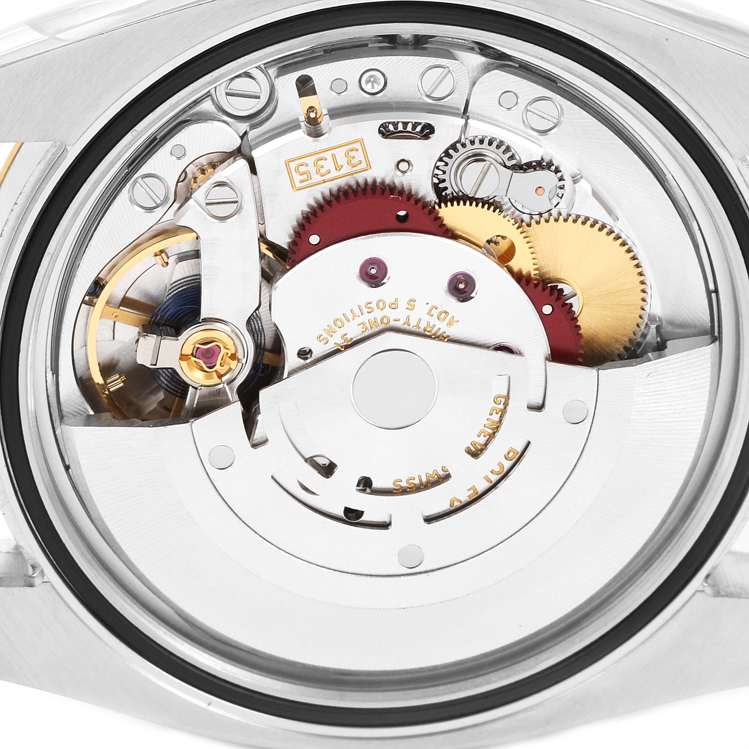 This image shows the internal mechanism of a Rolex Datejust 116233 Men
s Steel and Gold (two tone) Black Dial 116233 Men
s Steel and Gold (two tone) Black Dial watch viewed from the back.