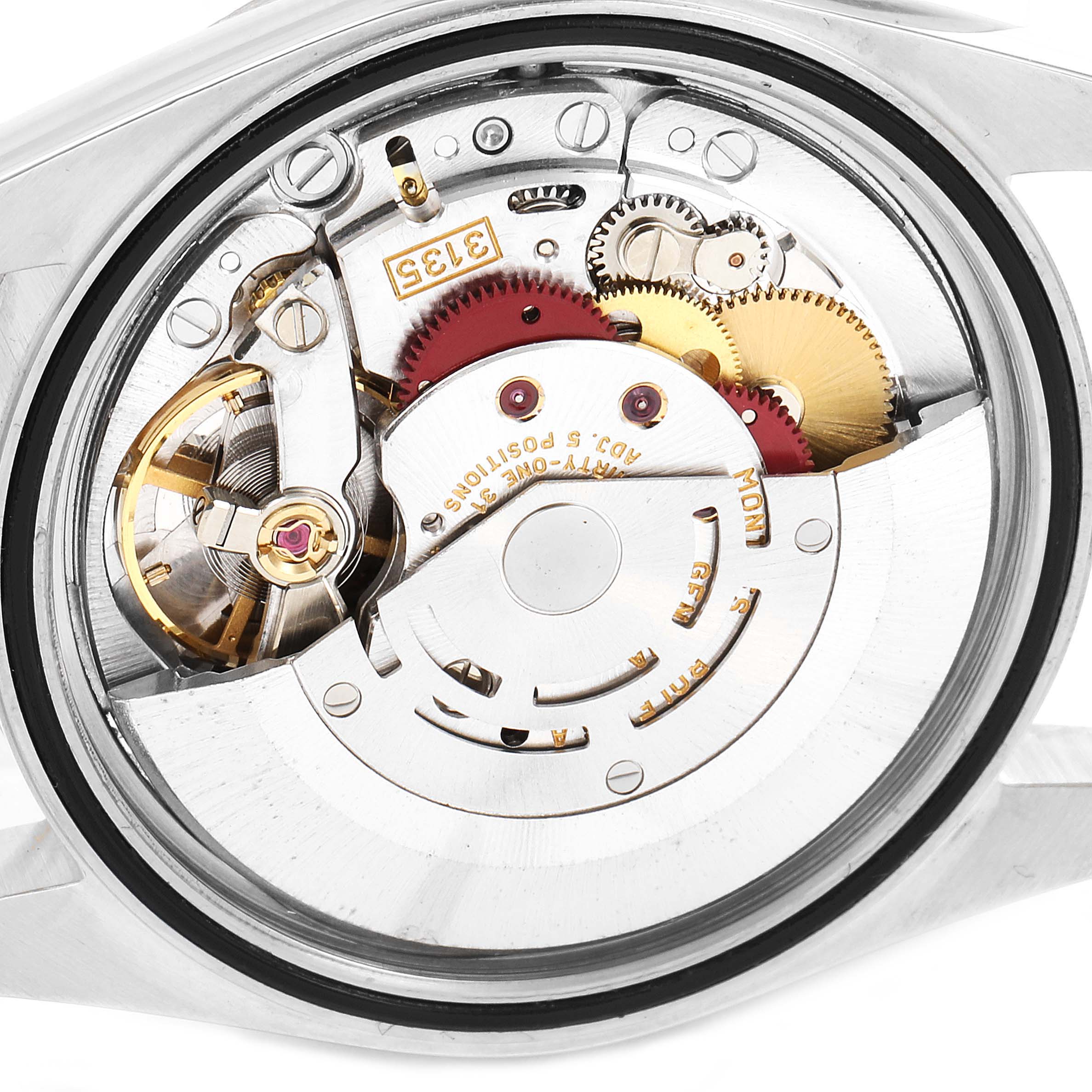 The image shows the movement mechanism of a Rolex Datejust 16233 Men
s Steel and Gold (two tone) Black Dial 16233 Men
s Steel and Gold (two tone) Black Dial watch, viewed from the back.