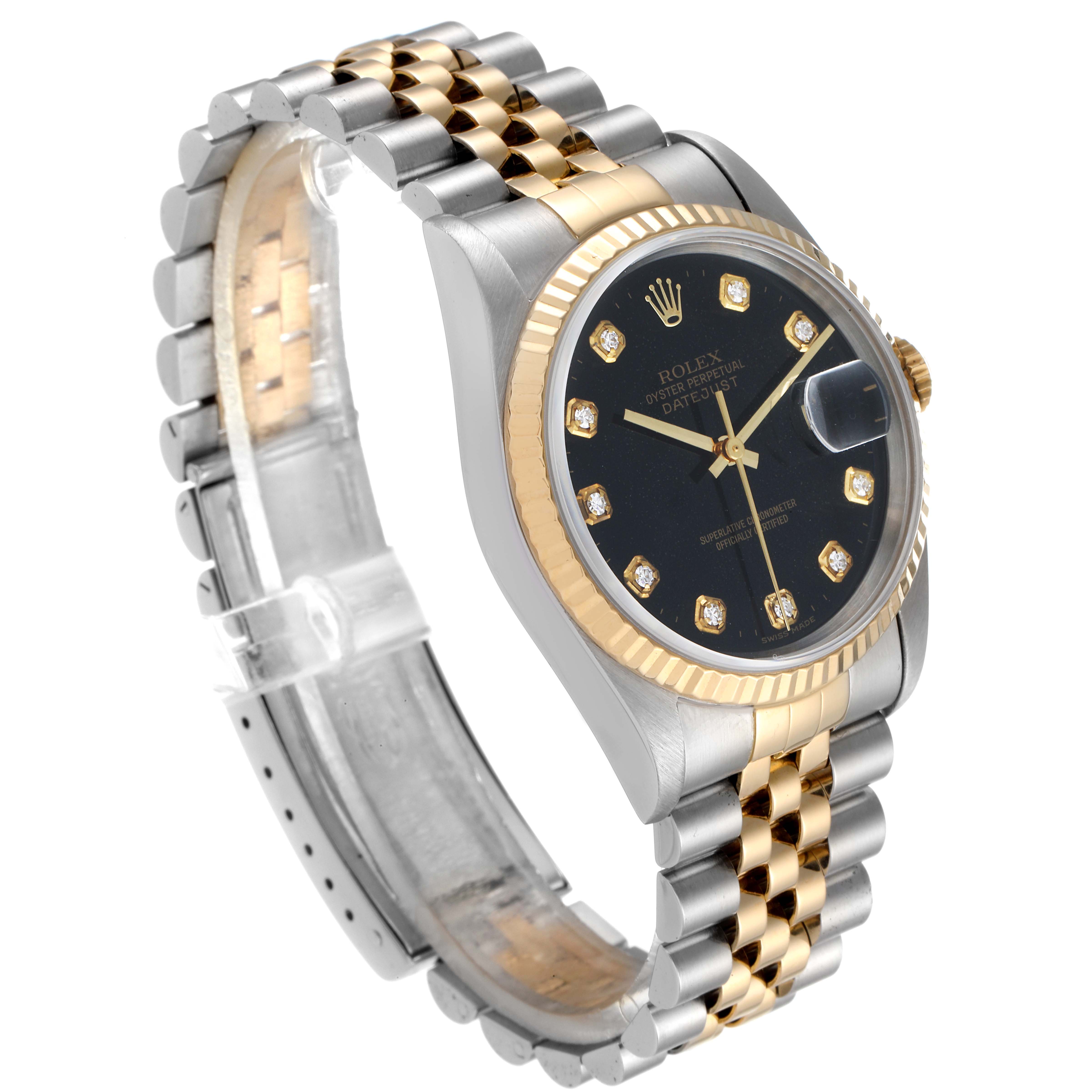 This is a side angle view showing the face, black dial, bezel, and two-tone jubilee bracelet of the Rolex Datejust 16233 Men
s Steel and Gold (two tone) Black Dial 16233 Men
s Steel and Gold (two tone) Black Dial watch.