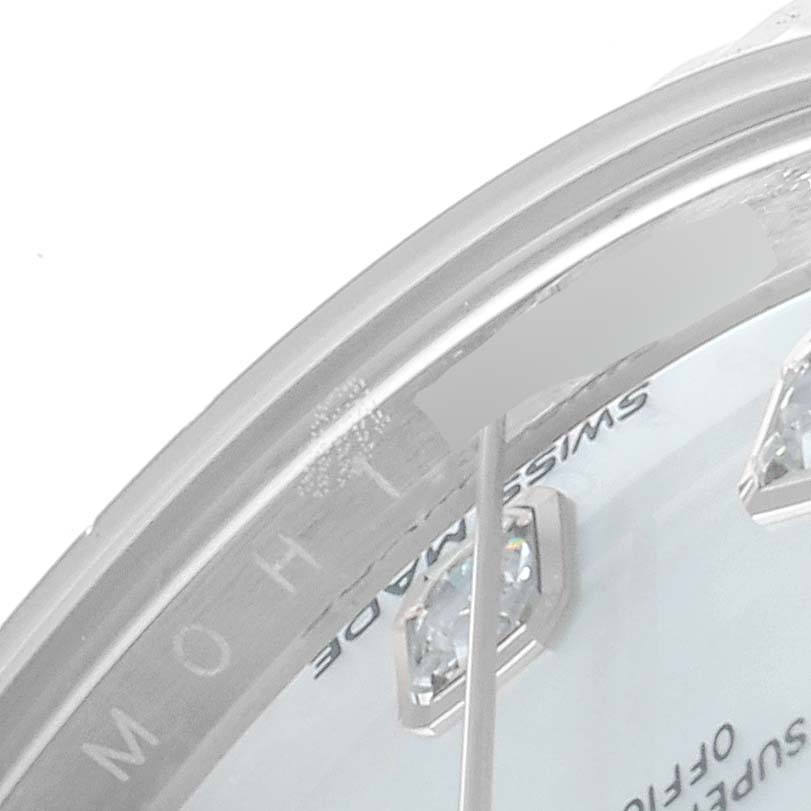 The image shows a partial close-up of the dial and crystal of a Rolex Datejust 279174 Women
s Stainless Steel Mother of Pearl Dial 279174 Women
s Stainless Steel Mother of Pearl Dial watch, highlighting the hour markers and text.
