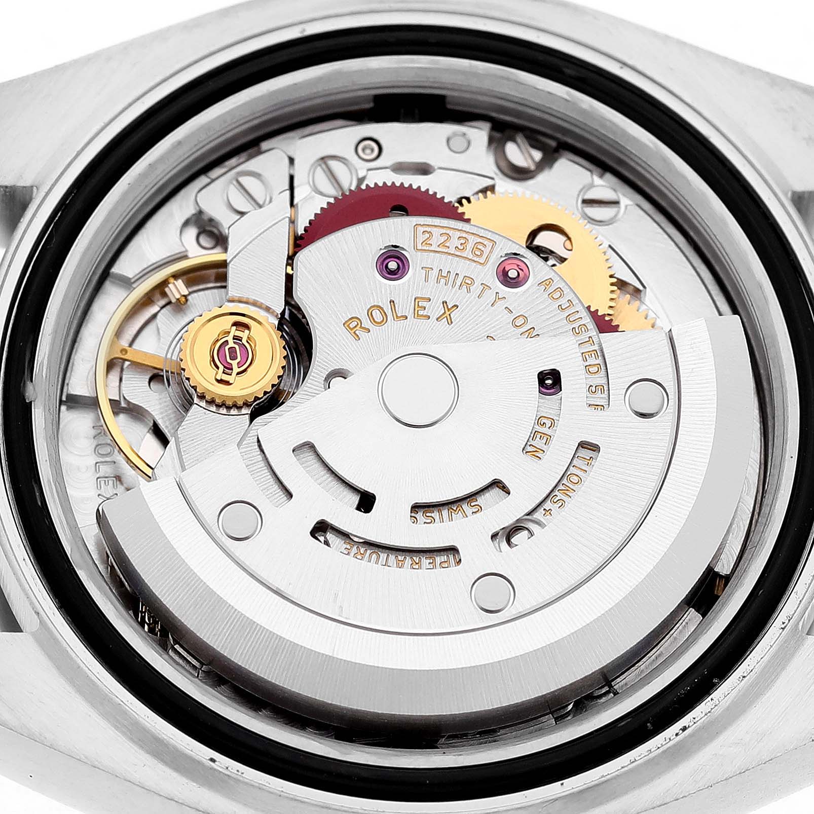 The image shows the back view of the Rolex Datejust 279174 Women's Stainless Steel White Dial, highlighting the movement components inside the case.