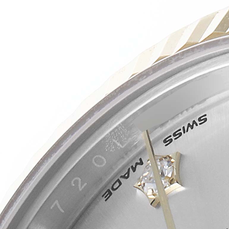 The image shows a close-up of the dial and bezel of a Rolex Datejust 279173 Women
s Steel and Gold (two tone) Silver Dial 279173 Women
s Steel and Gold (two tone) Silver Dial watch, highlighting the "SWISS MADE" text and diamond marker.