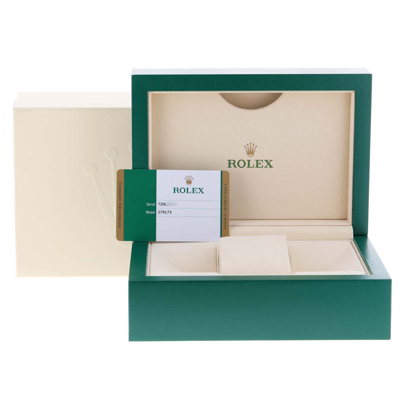 The image shows a Rolex Datejust 279173 Women
s Steel and Gold (two tone) Silver Dial 279173 Women
s Steel and Gold (two tone) Silver Dial box and warranty card from a front angle.