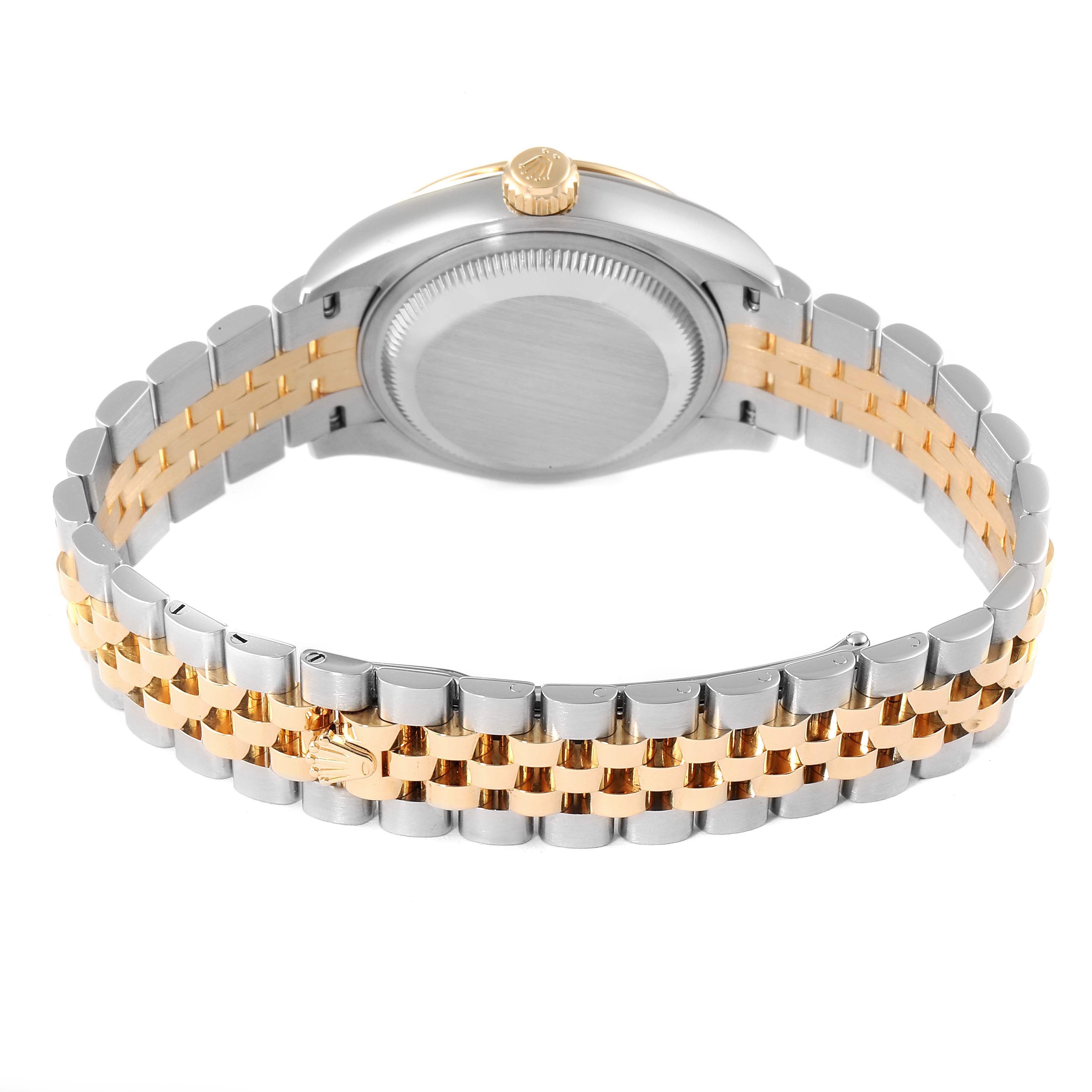 The image shows the back view of a Rolex Datejust 279173 Women
s Steel and Gold (two tone) Silver Dial 279173 Women
s Steel and Gold (two tone) Silver Dial watch, highlighting its two-tone bracelet and case back.