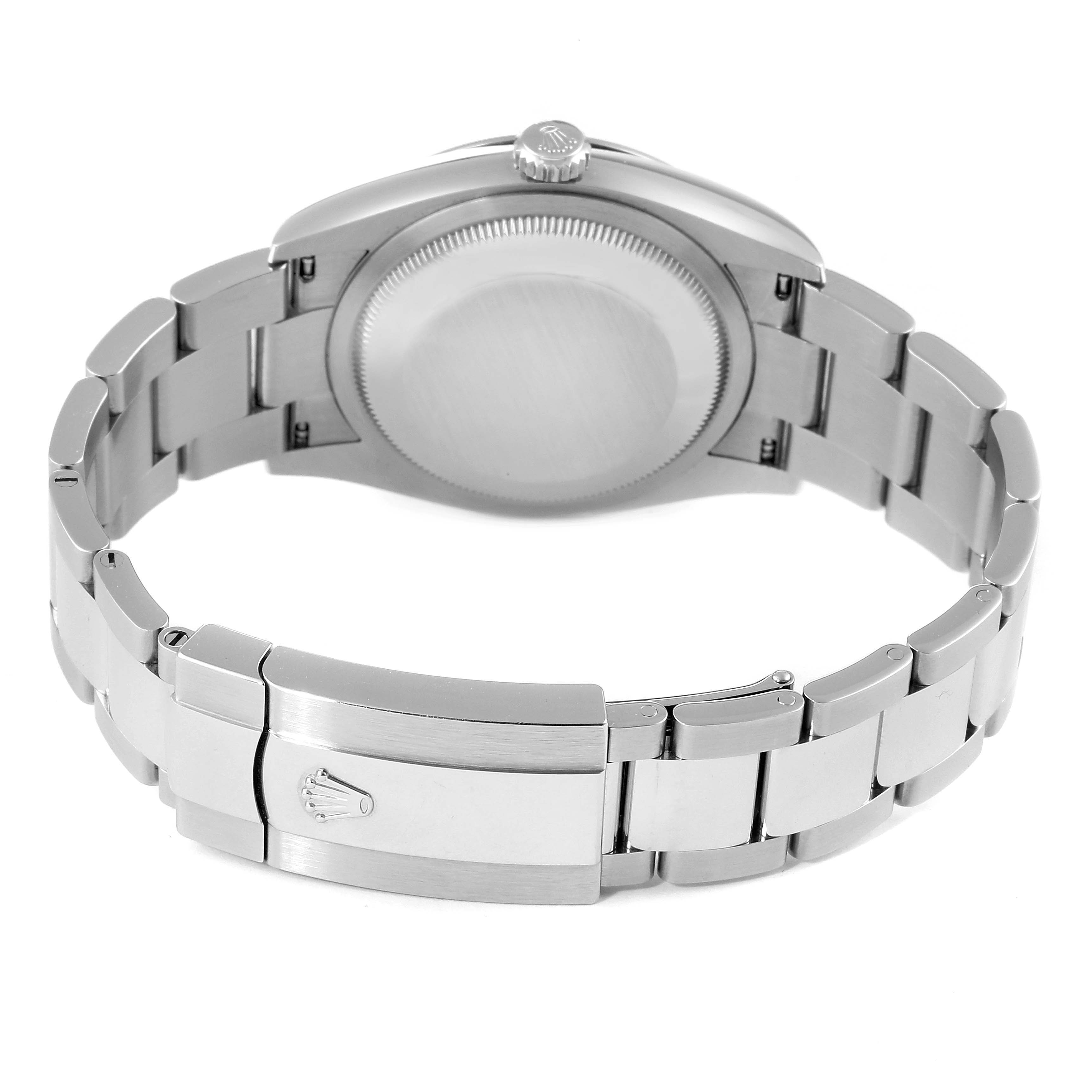 This image shows the back and bracelet of a Rolex Datejust 126200 Men
s Stainless Steel Blue Dial 126200 Men
s Stainless Steel Blue Dial watch at a slightly elevated angle.