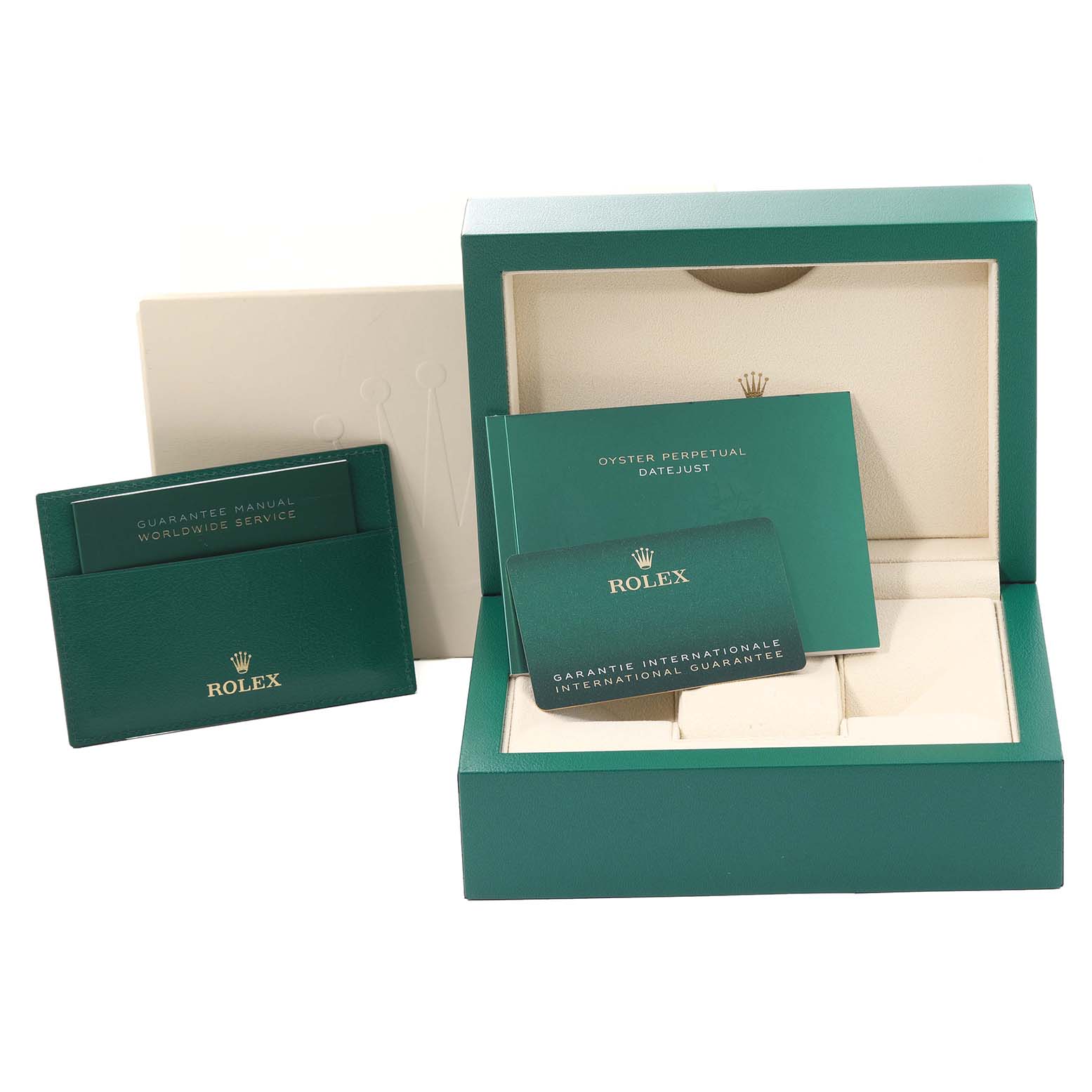 This image shows the packaging, guarantee booklet, service manual, and papers for the Rolex Datejust 126200 Men's Stainless Steel Blue Dial 126200 Men's Stainless Steel Blue Dial watch.