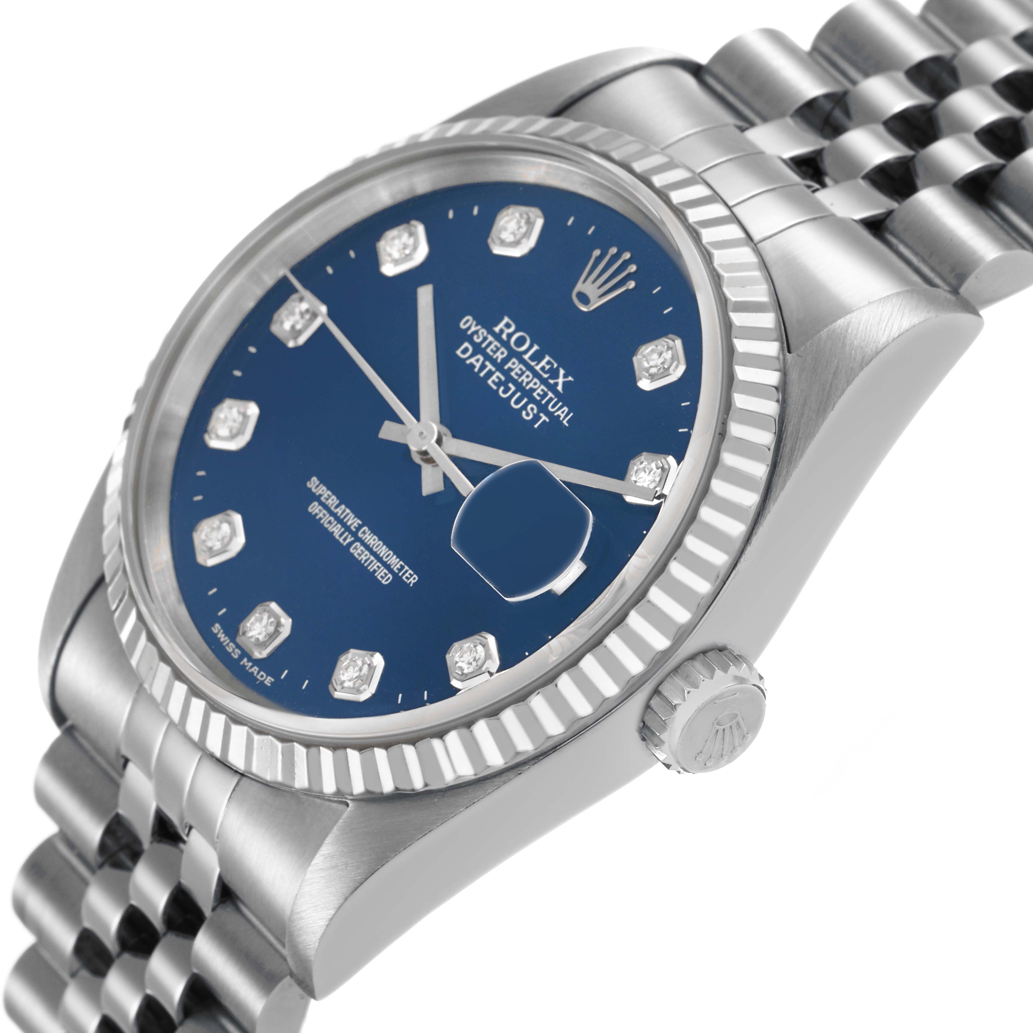 The Rolex Datejust 16234 Men's Stainless Steel Blue Dial watch is shown at an oblique angle, displaying the blue dial, fluted bezel, and Jubilee bracelet.
