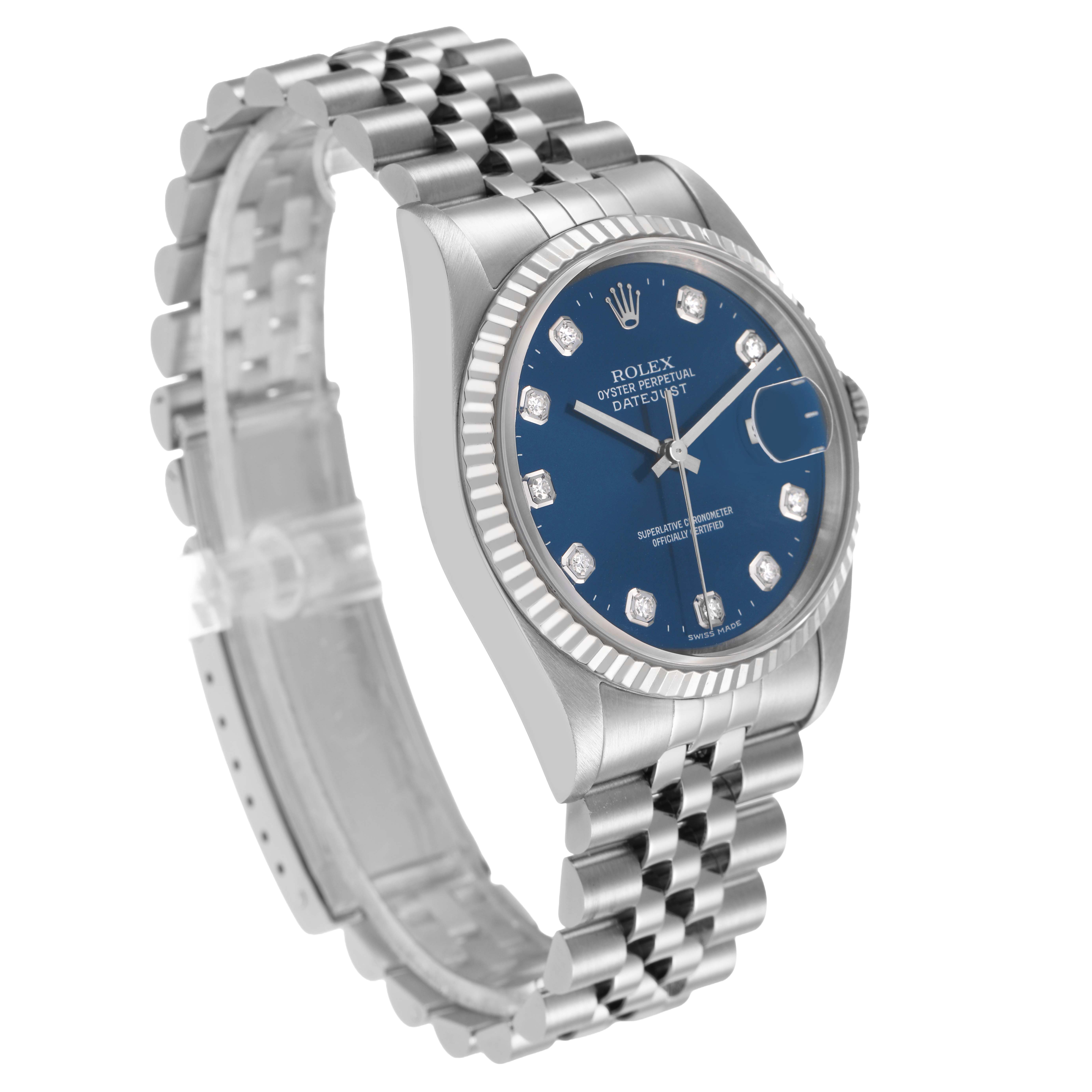 The Rolex Datejust 16234 Men's Stainless Steel Blue Dial watch is shown from a side angle, highlighting the blue dial, fluted bezel, and Jubilee bracelet.