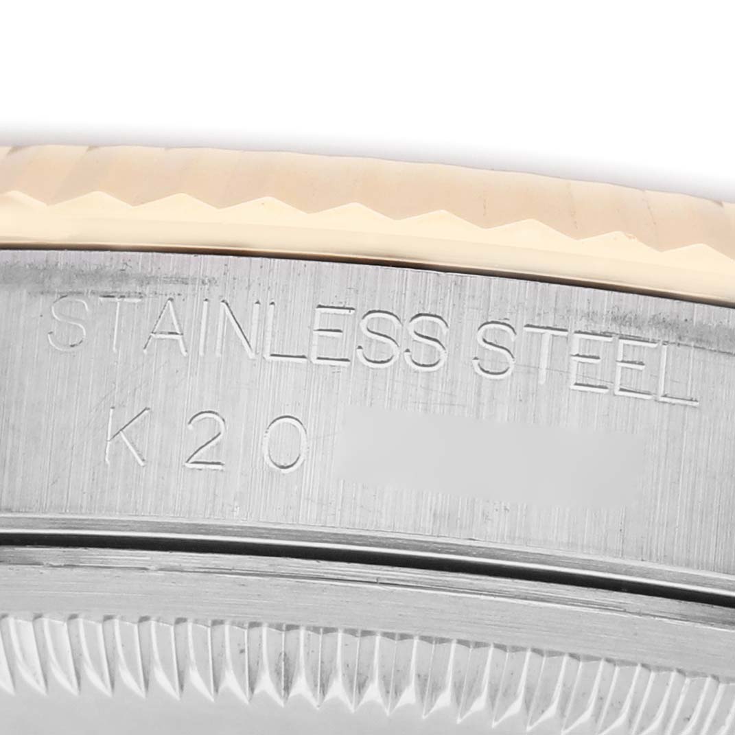 The image shows the side view of the stainless steel case and bezel of a Rolex Datejust 16233 Men's Stainless Steel Champagne Dial.