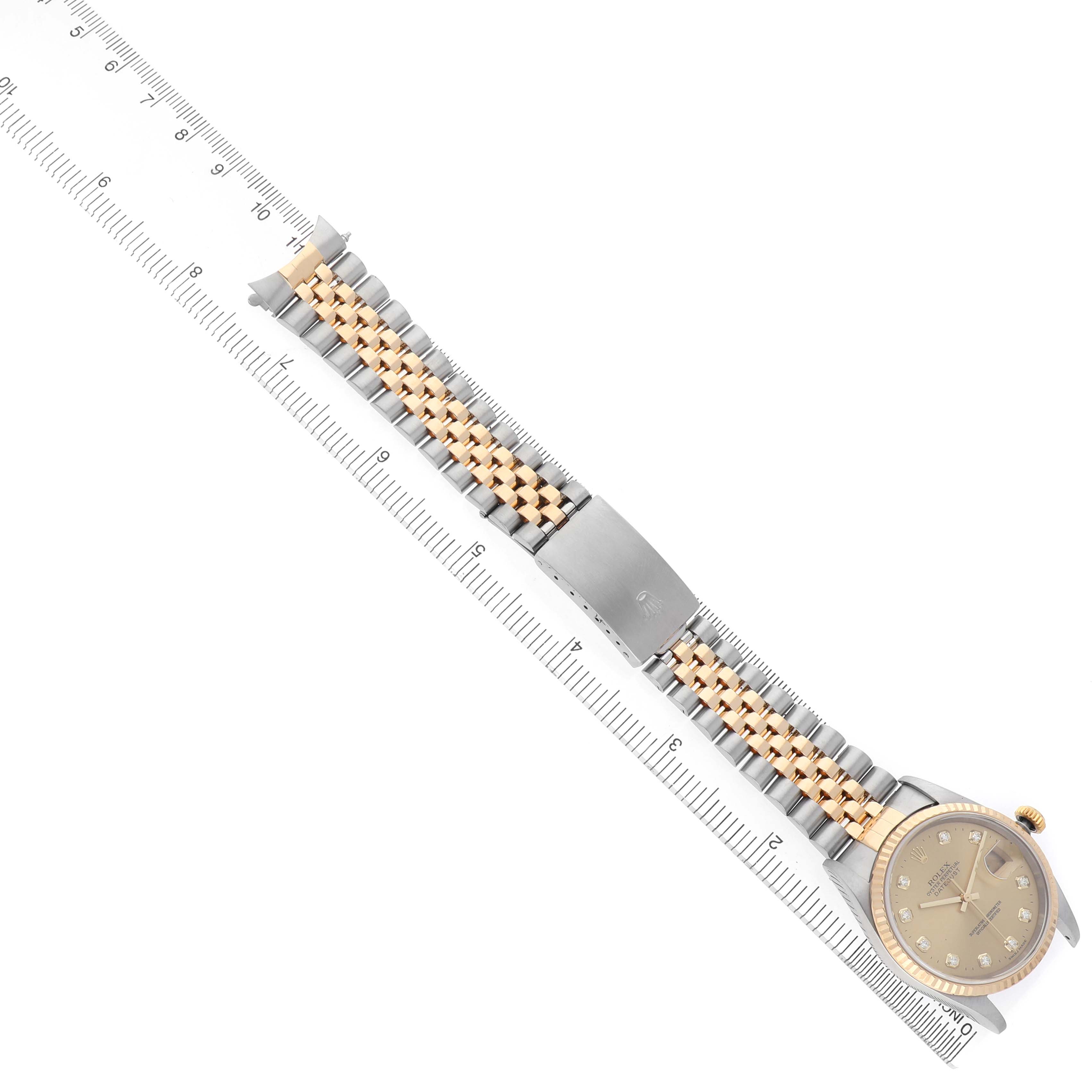 The Rolex Datejust 16233 Men's Steel and Gold (two tone) Champagne Dial watch is shown from a top view, highlighting the face, bezel, and two-tone bracelet.