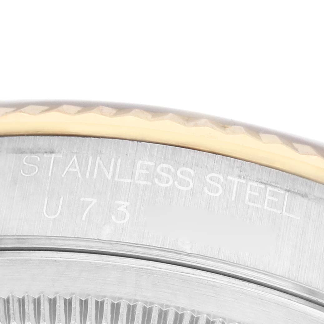 The image shows a close-up of the side and back of the Rolex Datejust 16233 Men's Steel and Gold (two tone) Champagne Dial, highlighting the stainless steel material.