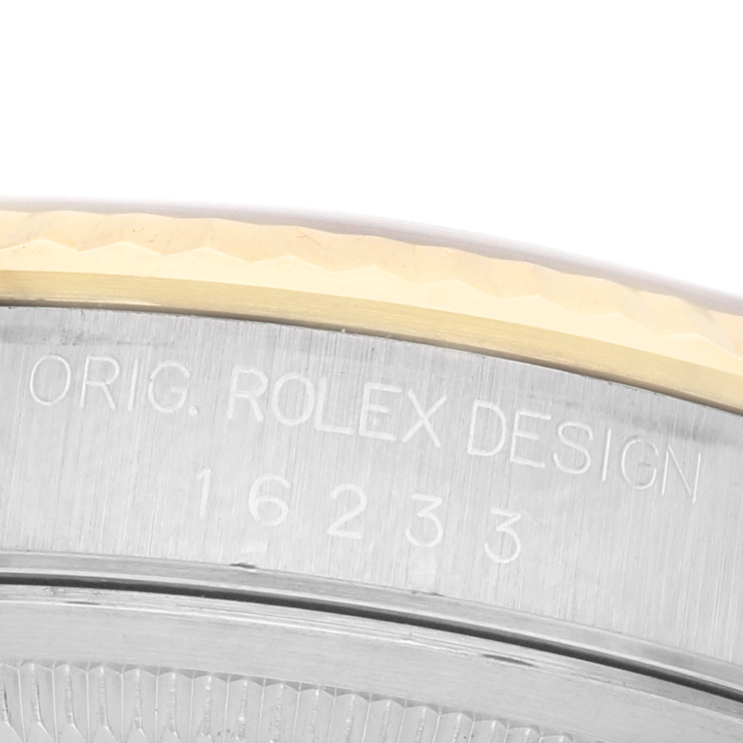 The image shows a close-up of the side engraving on a Rolex Datejust 16233 Men's Steel and Gold (two tone) Champagne Dial, displaying "ORIG. ROLEX DESIGN" and model number.
