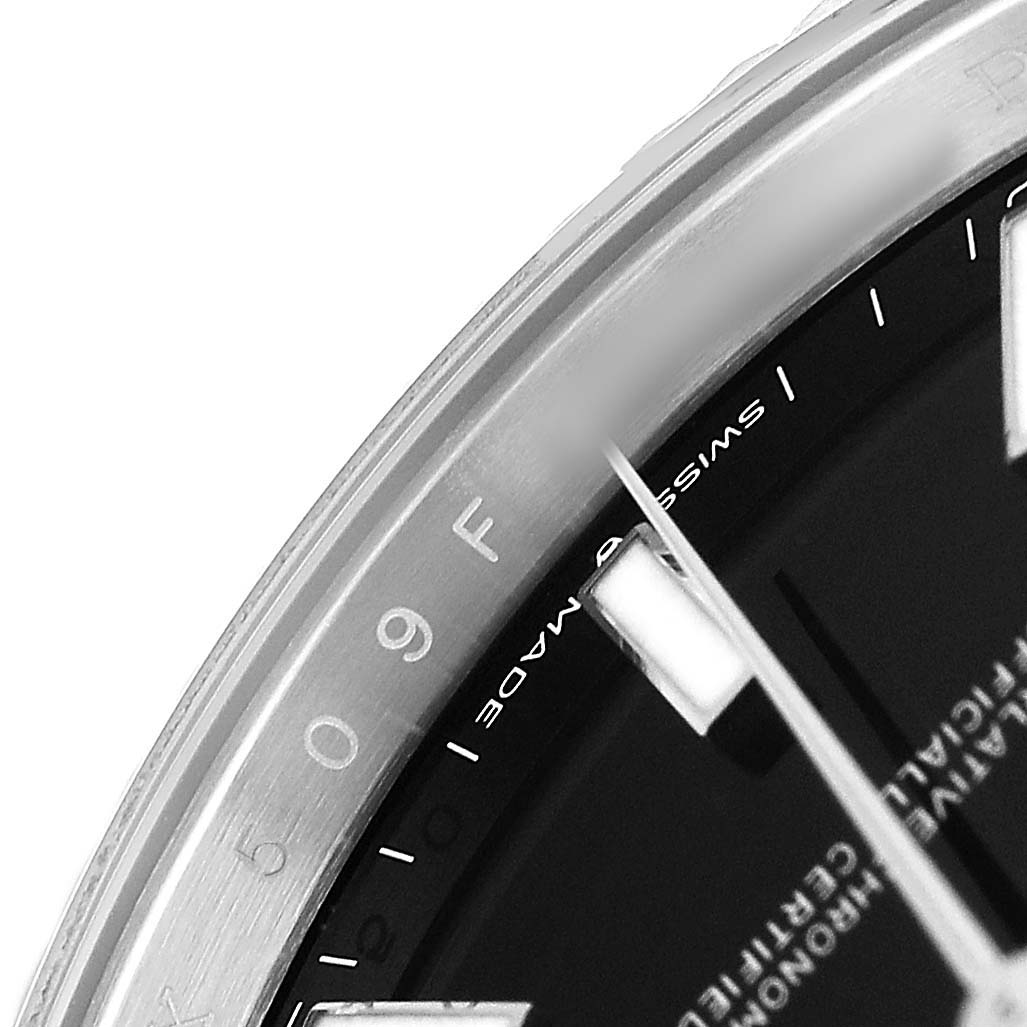 The image shows a close-up of the Rolex Datejust 41 M126334-0018 Men's Stainless Steel Black Dial's bezel, part of the dial, and watch hands.