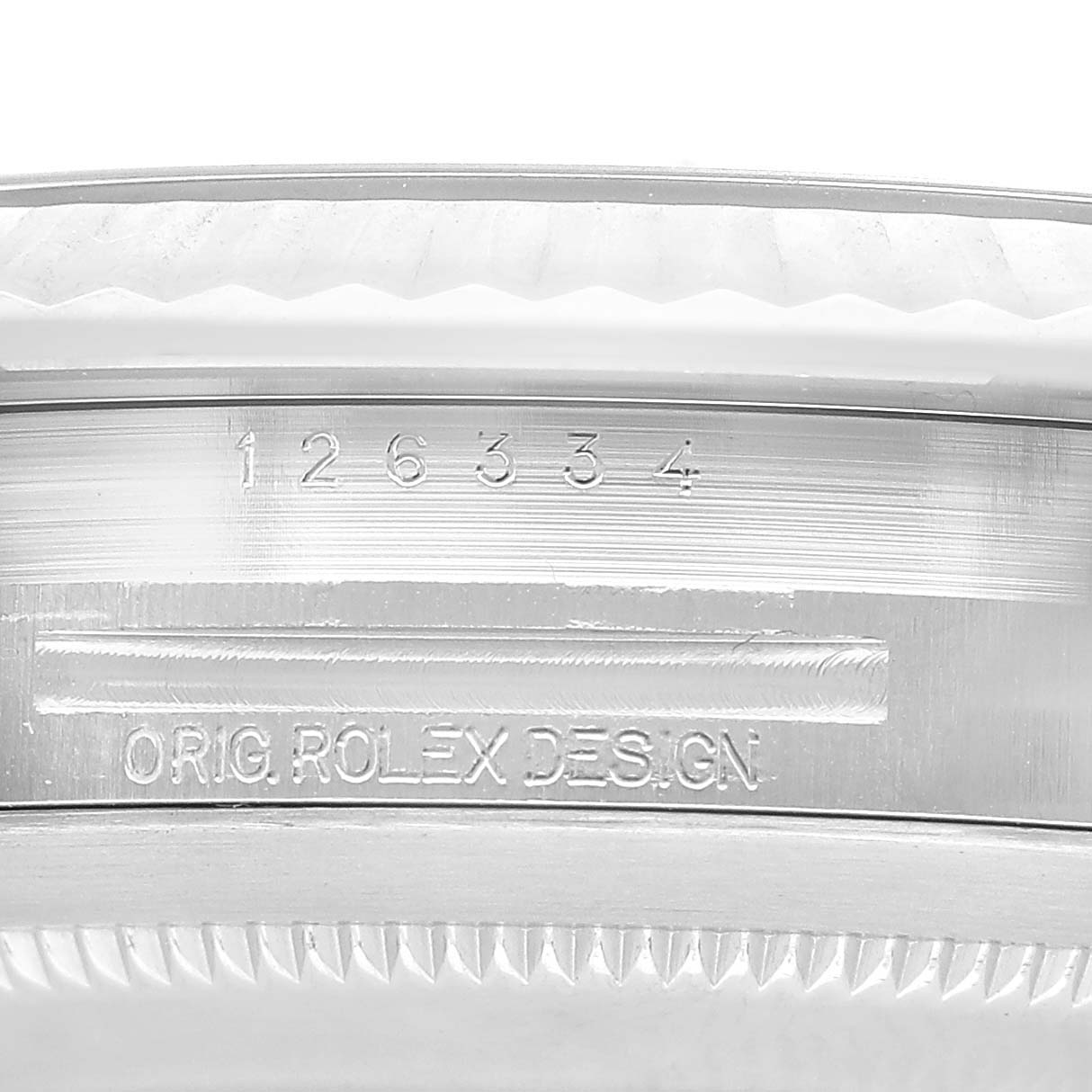 The image shows the edge of the Rolex Datejust 41 M126334-0018 Men's Stainless Steel Black Dial case with engravings visible, focusing on the side view.