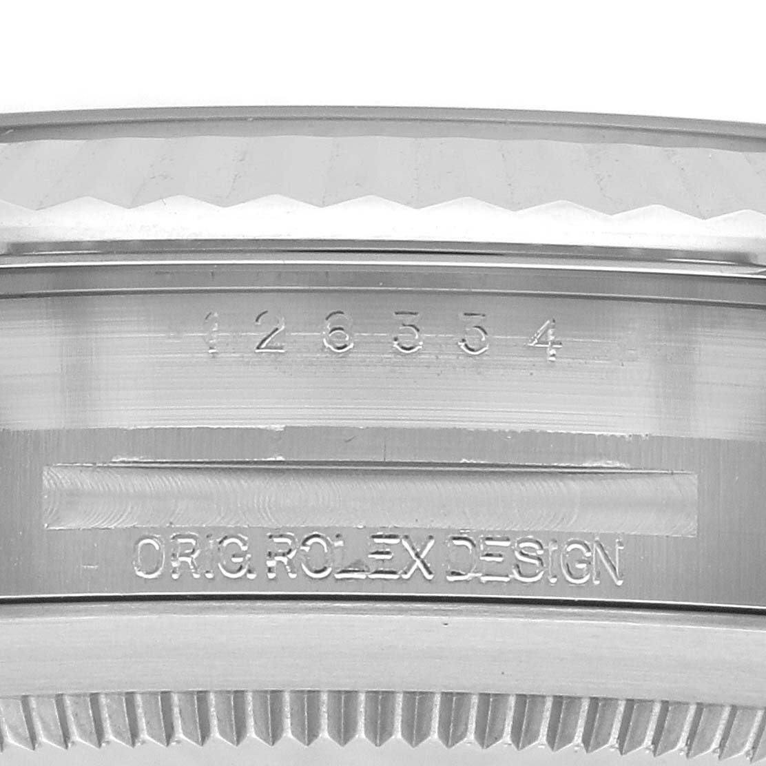 The image shows a close-up of the bezel and case side of a Rolex Datejust 41 126334 Men
s Stainless Steel Silver Dial 126334 Men
s Stainless Steel Silver Dial, featuring the model number and "ORIG ROLEX DESIGN" engraving.