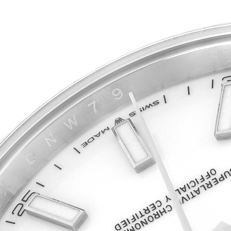 The image shows a close-up of the dial and bezel with hour markers of a Rolex Datejust 41 126334 Men
s Stainless Steel White Dial 126334 Men
s Stainless Steel White Dial.