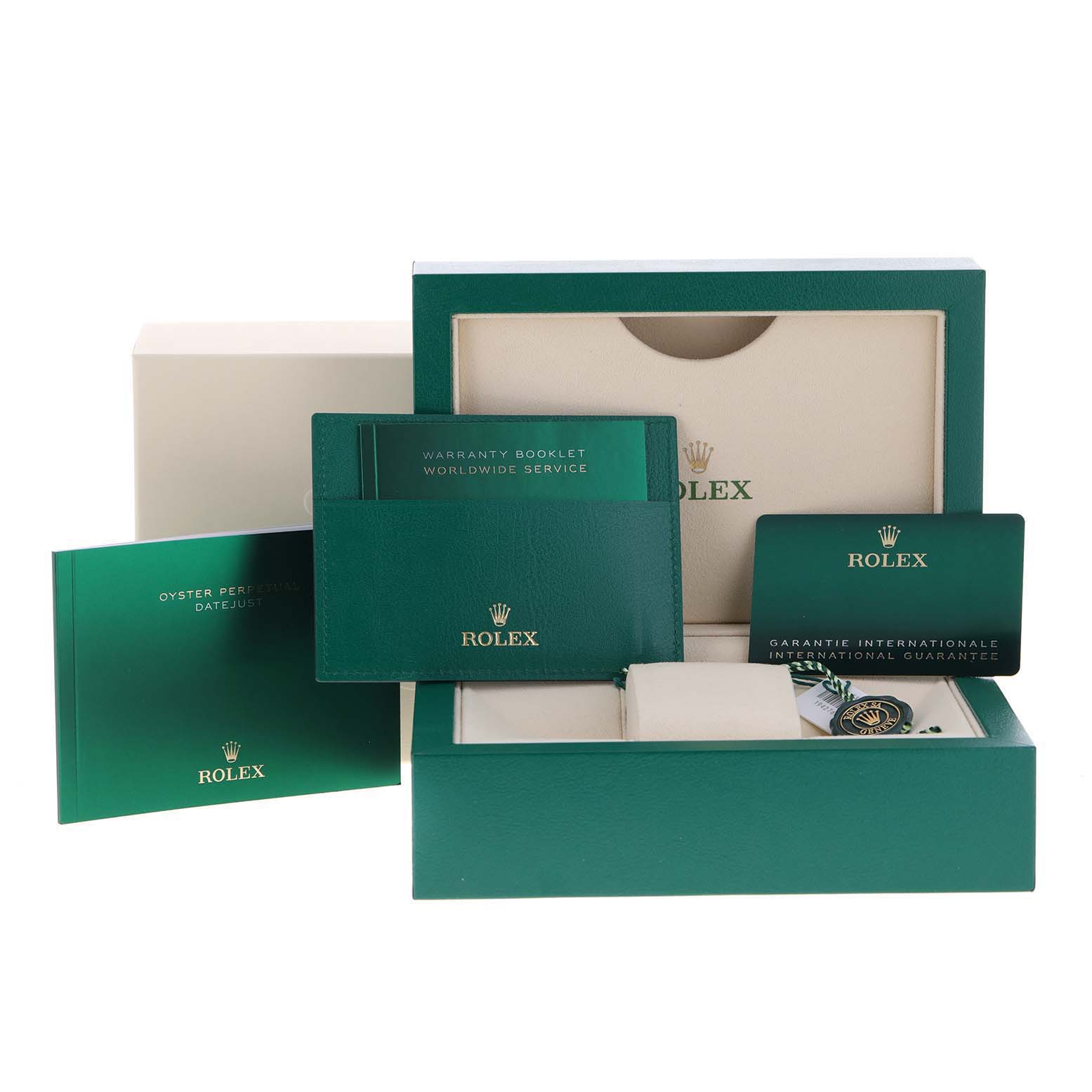 This image shows the packaging, warranty booklet, and international guarantee card for a Rolex Datejust 41 126334 Men
s Stainless Steel White Dial 126334 Men
s Stainless Steel White Dial watch.