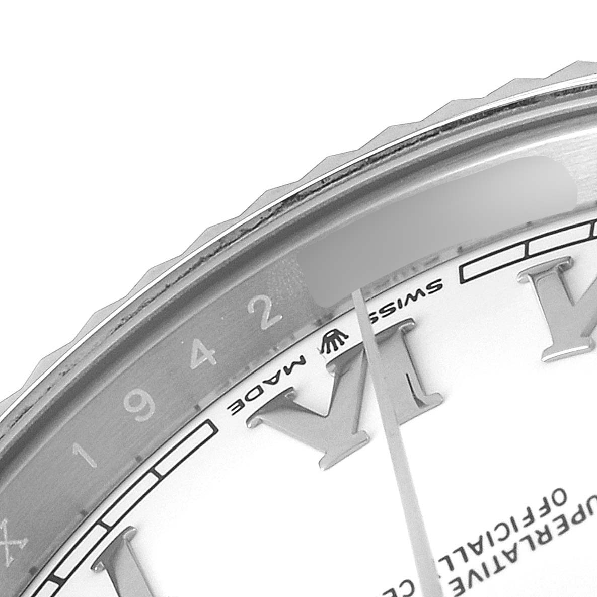 The image shows a close-up of the dial and part of the bezel of a Rolex Datejust 41 126334 Men
s Stainless Steel White Dial 126334 Men
s Stainless Steel White Dial watch, highlighting the Roman numerals and the word "Swiss Made".