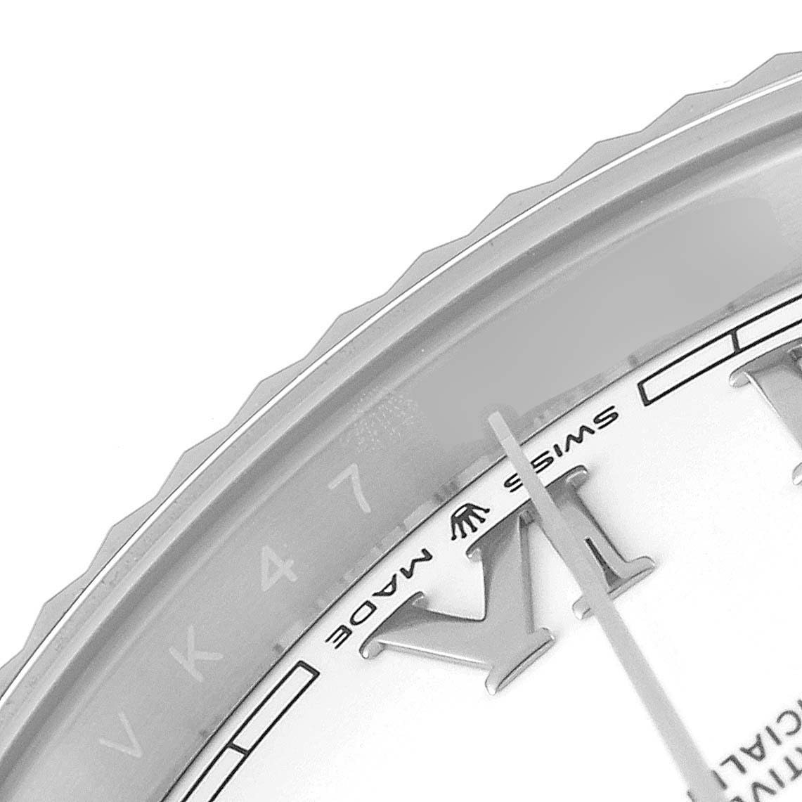 This close-up of the Rolex Datejust 41 126334 Men's Stainless Steel White Dial 126334 Men's Stainless Steel White Dial model shows the edge of the dial, part of the Roman numeral hour markers, and the "Swiss Made" text.