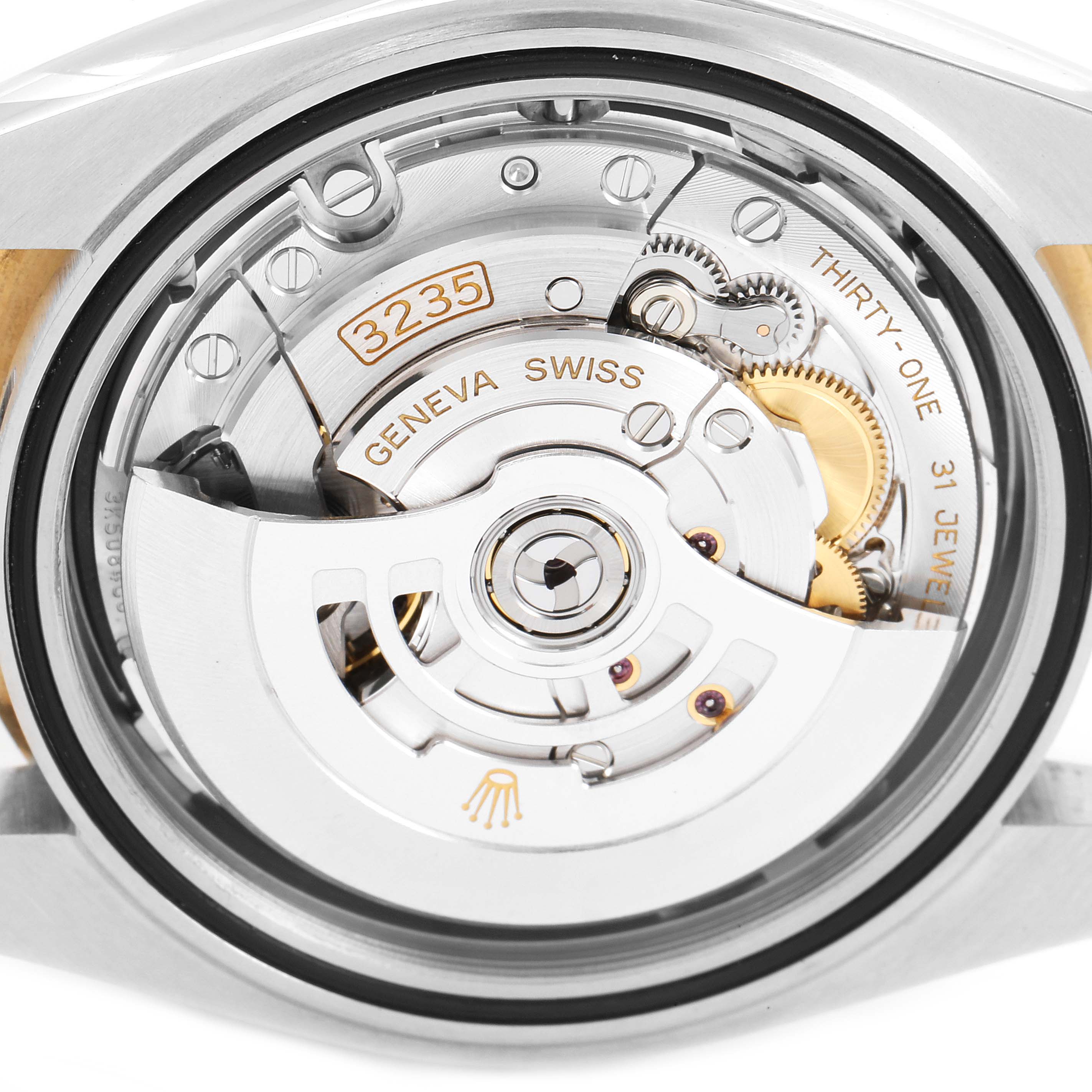 This image shows the movement and mechanisms of a Rolex Datejust 41 126333 Men's Steel and Gold (two tone) Black Dial 126333 Men's Steel and Gold (two tone) Black Dial model seen from a back angle.