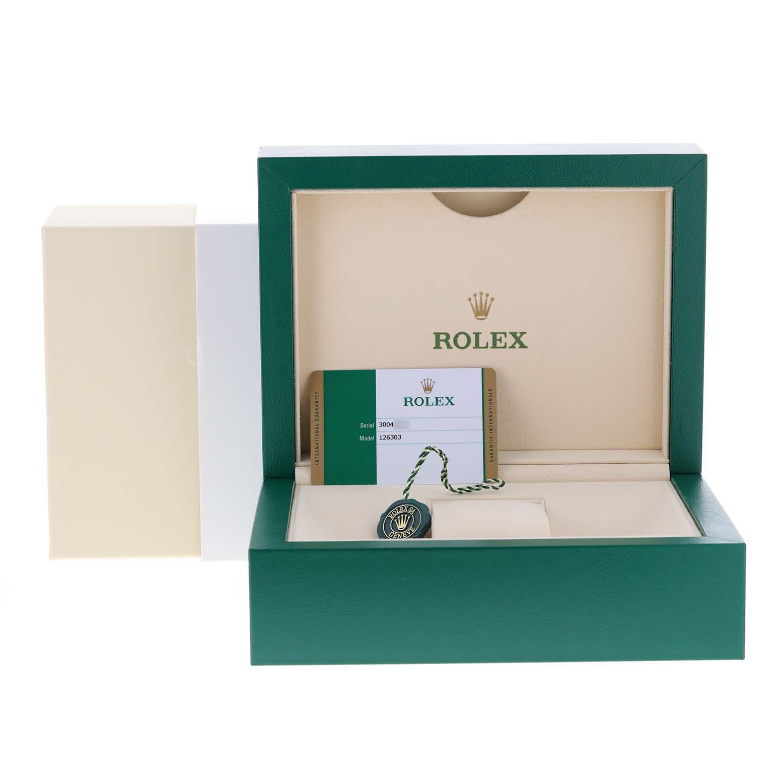 This image shows the packaging, warranty card, and hangtag for a Rolex Datejust 41 126303 Men
s Steel and Gold (two tone) Mother of Pearl Dial 126303 Men
s Steel and Gold (two tone) Mother of Pearl Dial.