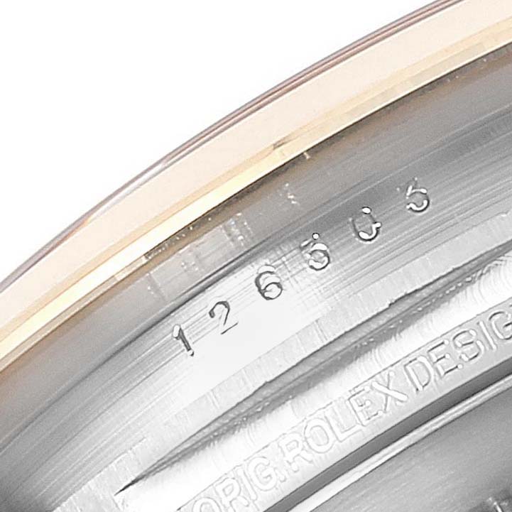 The image shows the engraved reference number and "ORIG ROLEX DESIGN" text on the inner bezel of a Rolex Datejust 41 126303 Men
s Steel and Gold (two tone) Mother of Pearl Dial 126303 Men
s Steel and Gold (two tone) Mother of Pearl Dial watch.