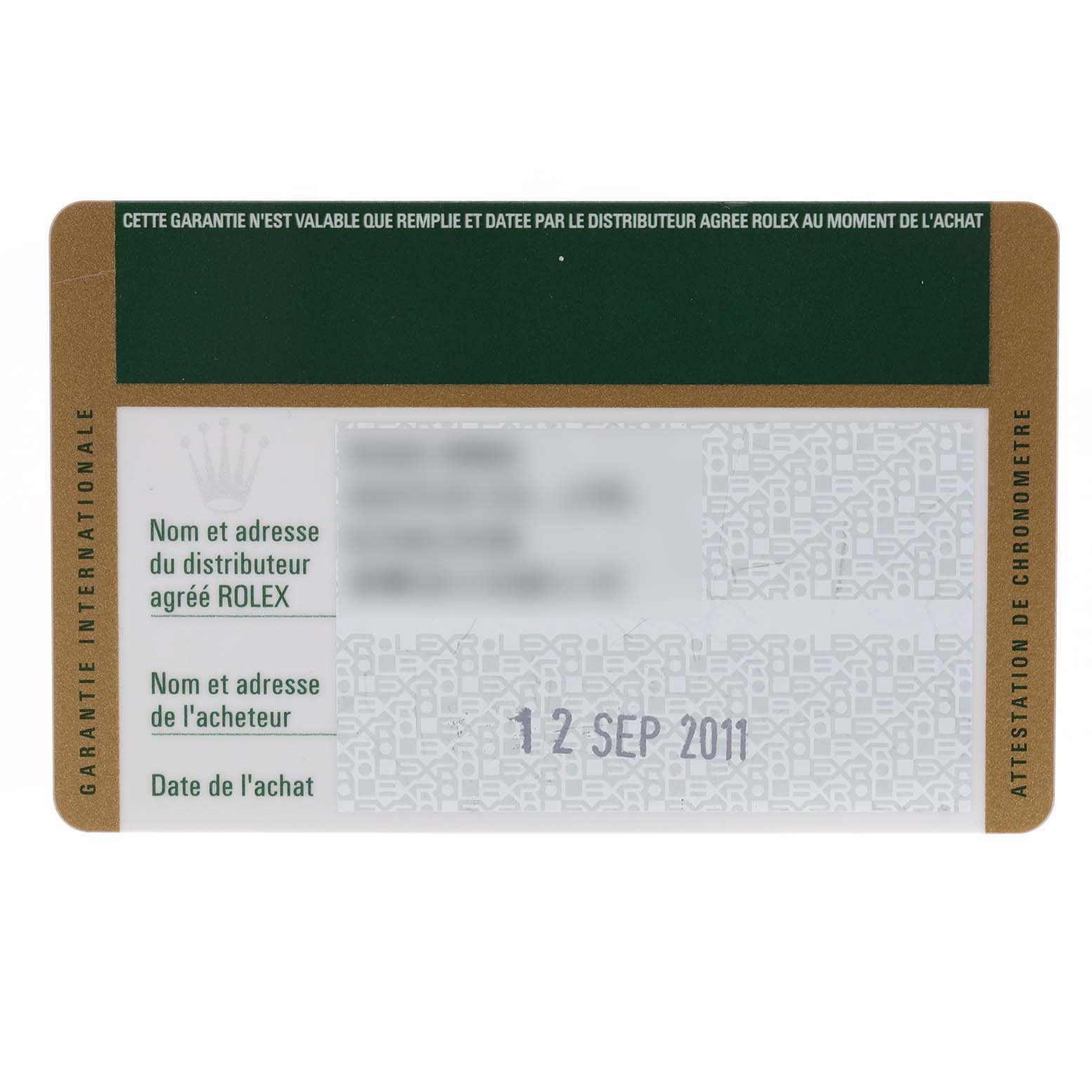 This image shows the guarantee card for a Mid-Size Rolex watch, featuring purchase details and dealer information.