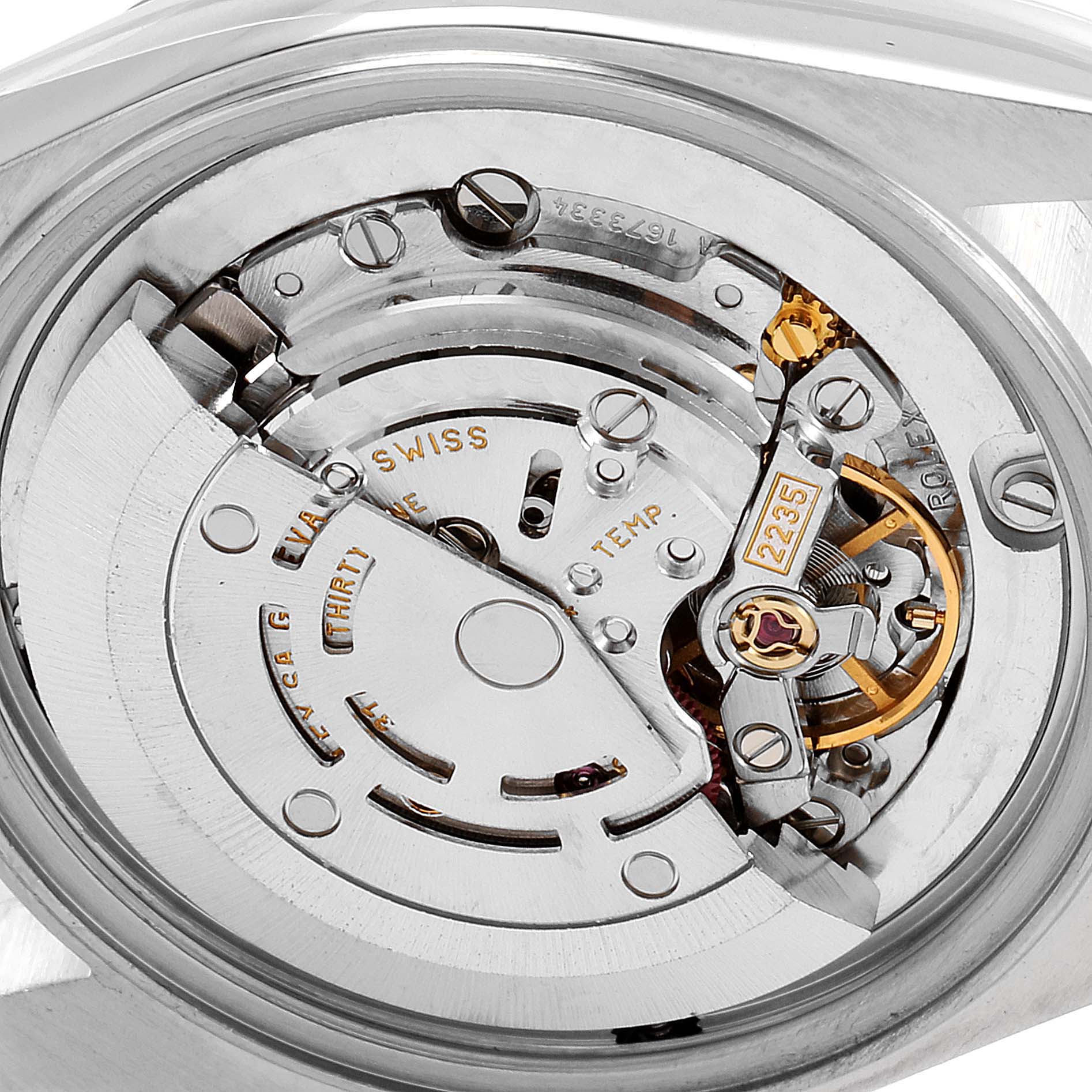 The image shows the internal mechanism of a Mid-Size Rolex watch, focusing on its movement and components from a rear view angle.