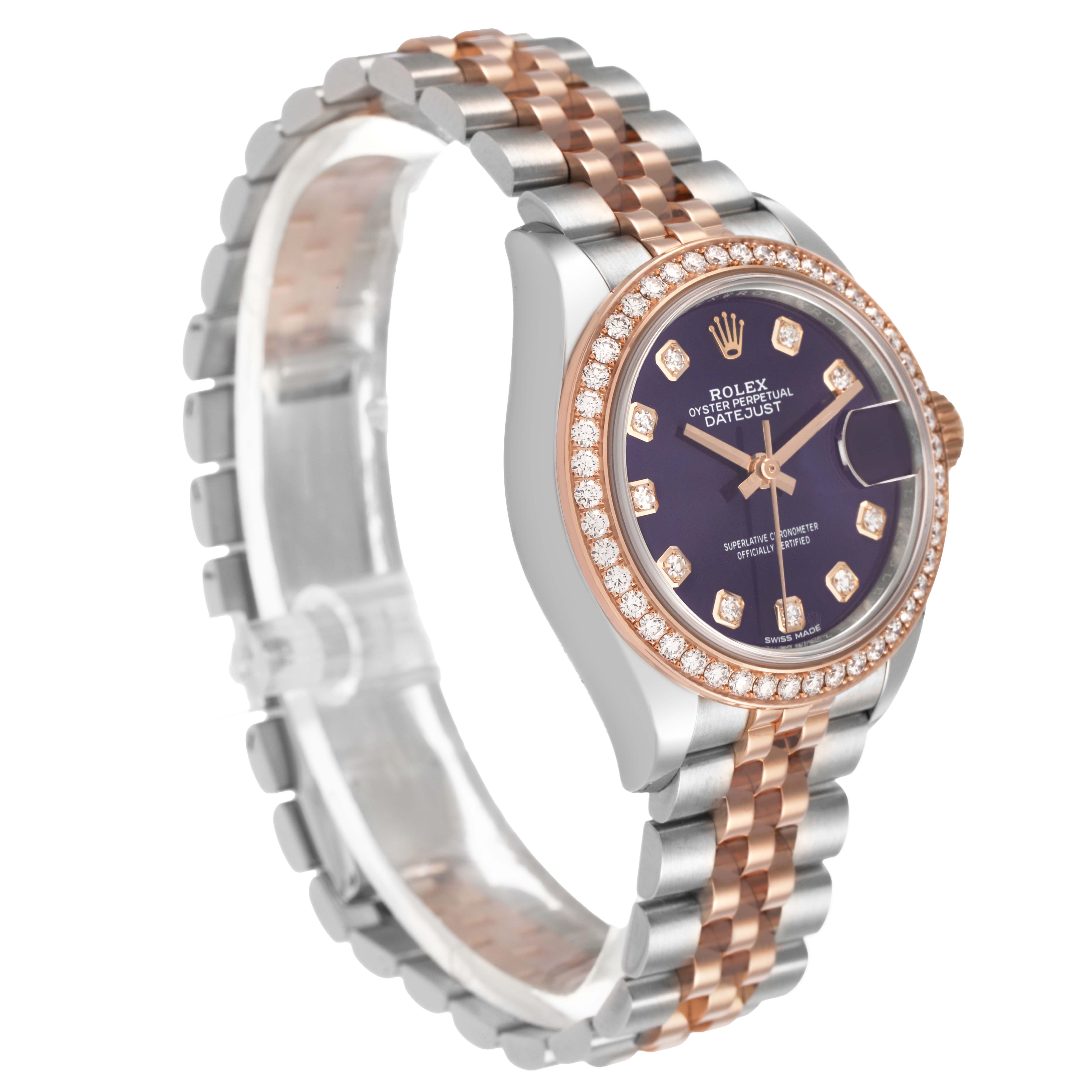 The Rolex Datejust 279381 Women's Steel and Gold (two tone) Purple Dial watch is shown from a three-quarter angle, highlighting the face, bezel, and two-tone bracelet.