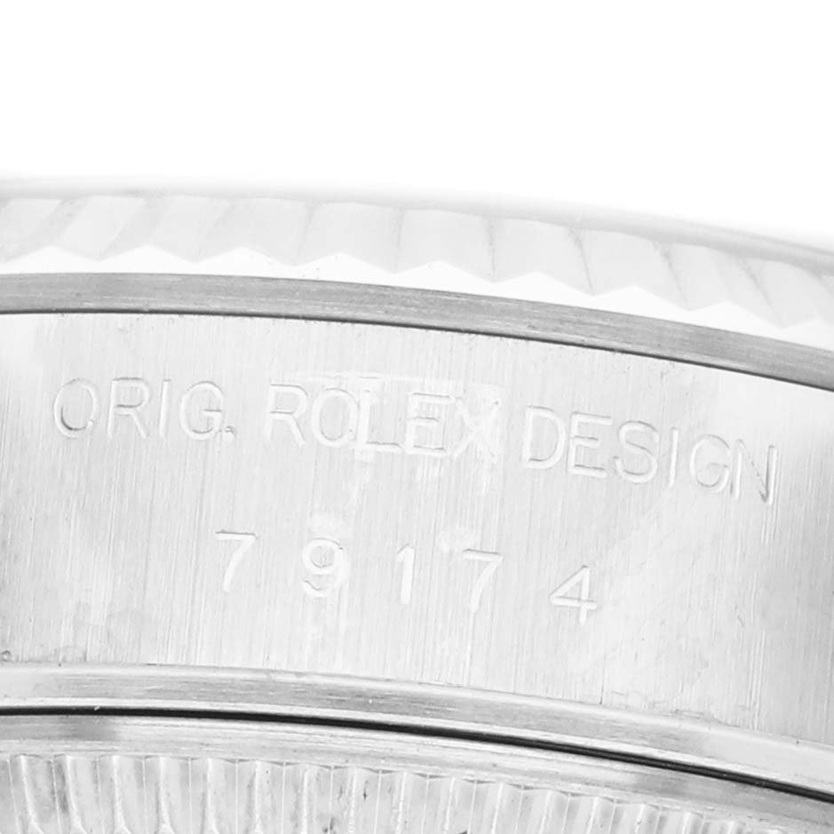 The image shows an engraved side view of a Rolex Datejust 79174 Women's Stainless Steel Pink Dial, highlighting the case with its model number.