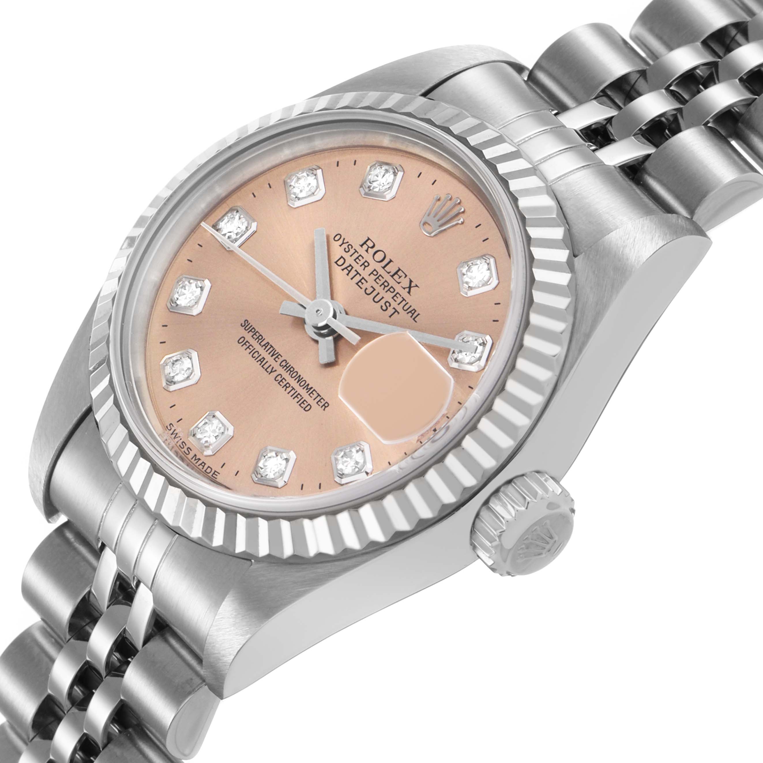 The Rolex Datejust 79174 Women's Stainless Steel Pink Dial watch is shown at an angled view displaying the face, fluted bezel, crown, and part of the bracelet.