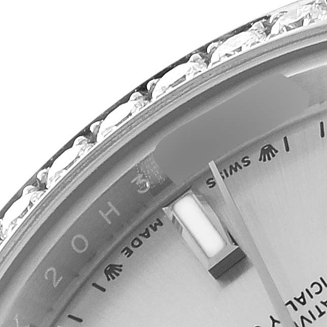 This close-up image shows part of the bezel, dial, and date magnifier of the Rolex Datejust 279384RBR Women's Stainless Steel Silver Dial 279384RBR Women's Stainless Steel Silver Dial watch.