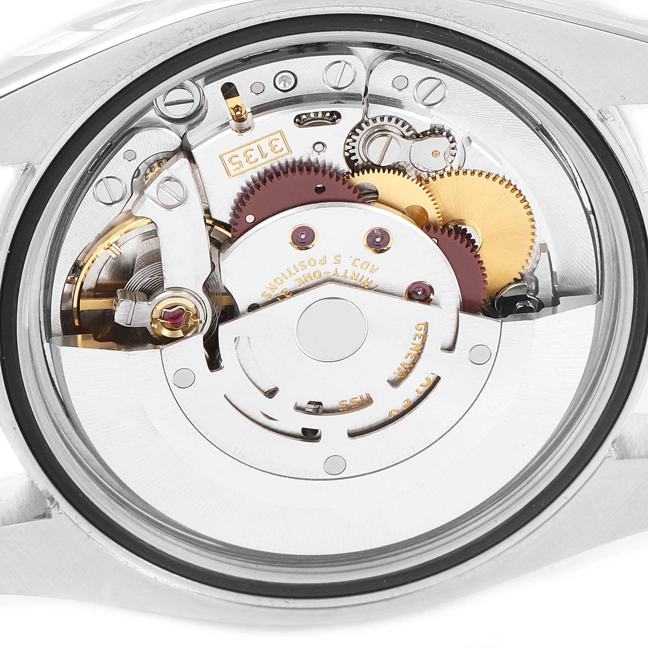 This image shows the internal mechanical movement of a Rolex Datejust 116234 Men's Stainless Steel Silver Dial 116234 Men's Stainless Steel Silver Dial watch from a rear angle.