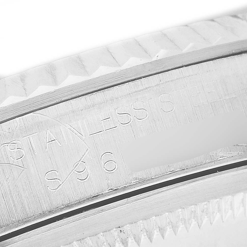 The image shows a close-up of the side engraving on the case of a Rolex Datejust 16234 Men's Stainless Steel Silver Dial watch.