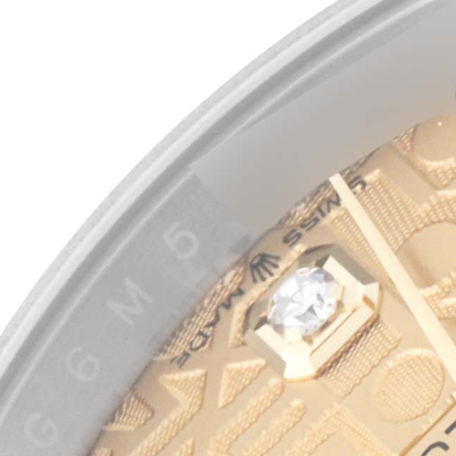 The image shows a close-up of the dial and diamond hour marker on a Rolex Datejust 126203 Men's Steel and Gold (two tone) Champagne Dial 126203 Men's Steel and Gold (two tone) Champagne Dial watch.