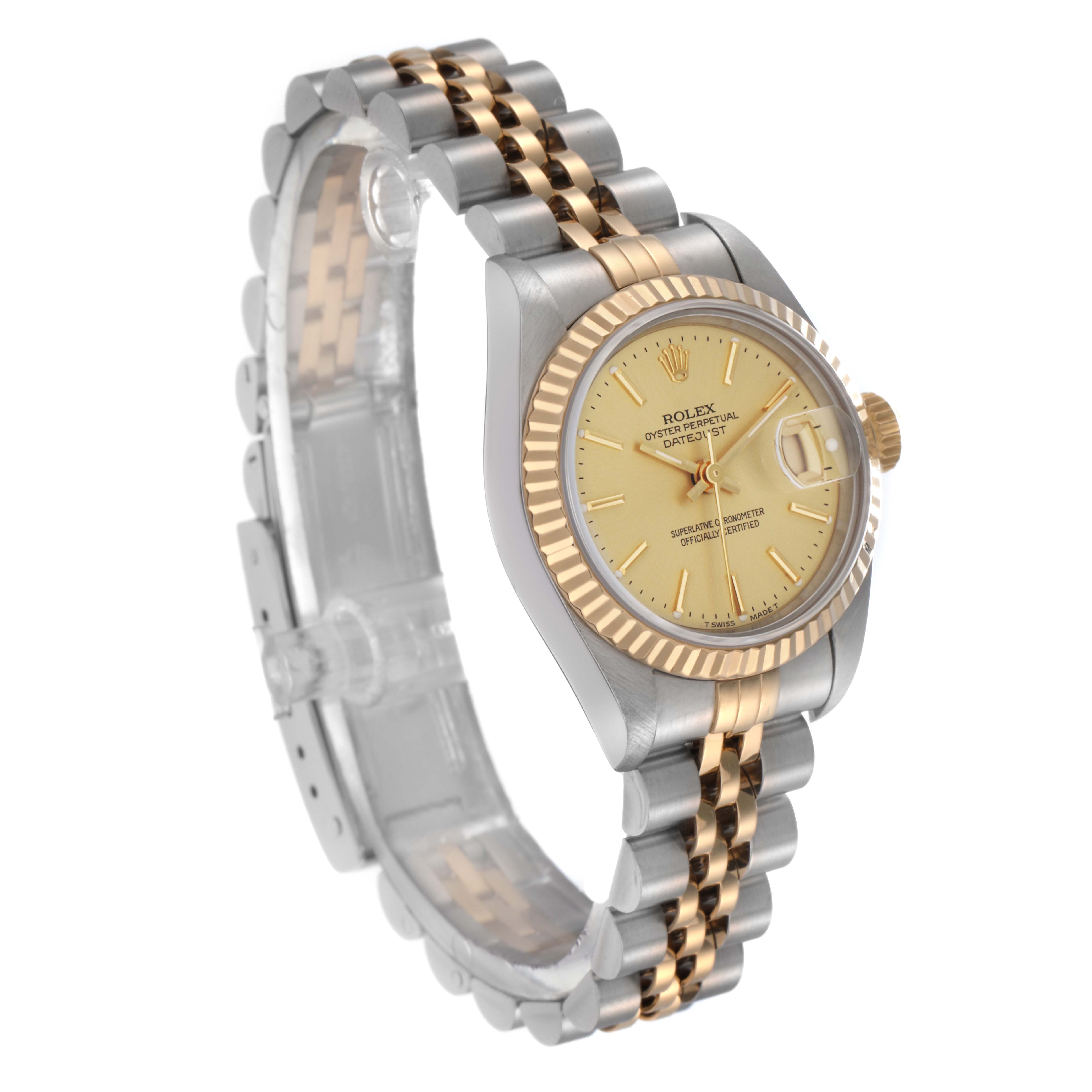 The Rolex Datejust 69173 Women
s Steel and Gold (two tone) Champagne Dial 69173 Women
s Steel and Gold (two tone) Champagne Dial watch is shown at a slight angle, highlighting its gold dial, fluted bezel, and two-tone bracelet.