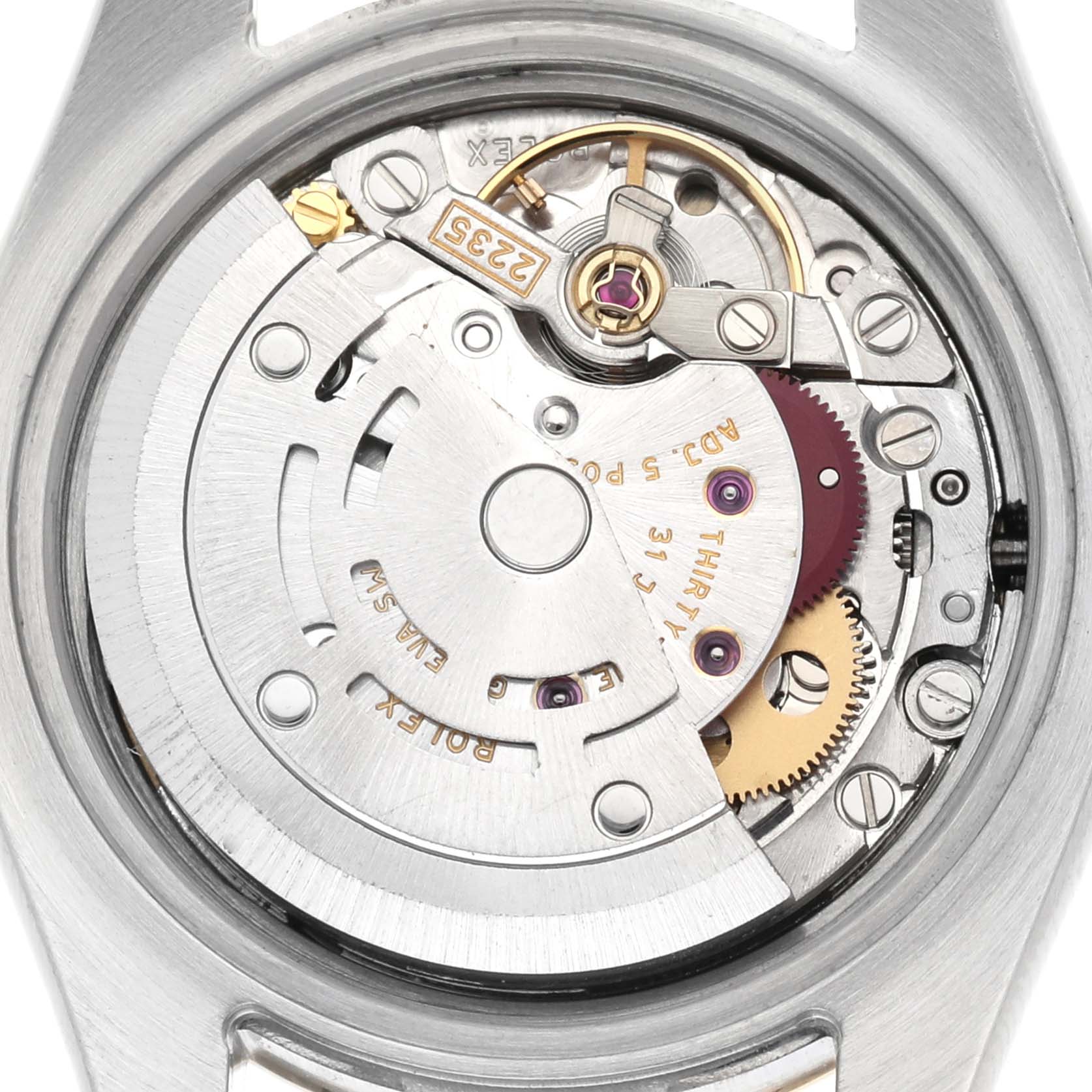 The image shows the back view of a Rolex Datejust 179173 Women
s Steel and Gold (two tone) Black Dial 179173 Women
s Steel and Gold (two tone) Black Dial, displaying its movement and internal mechanical components.