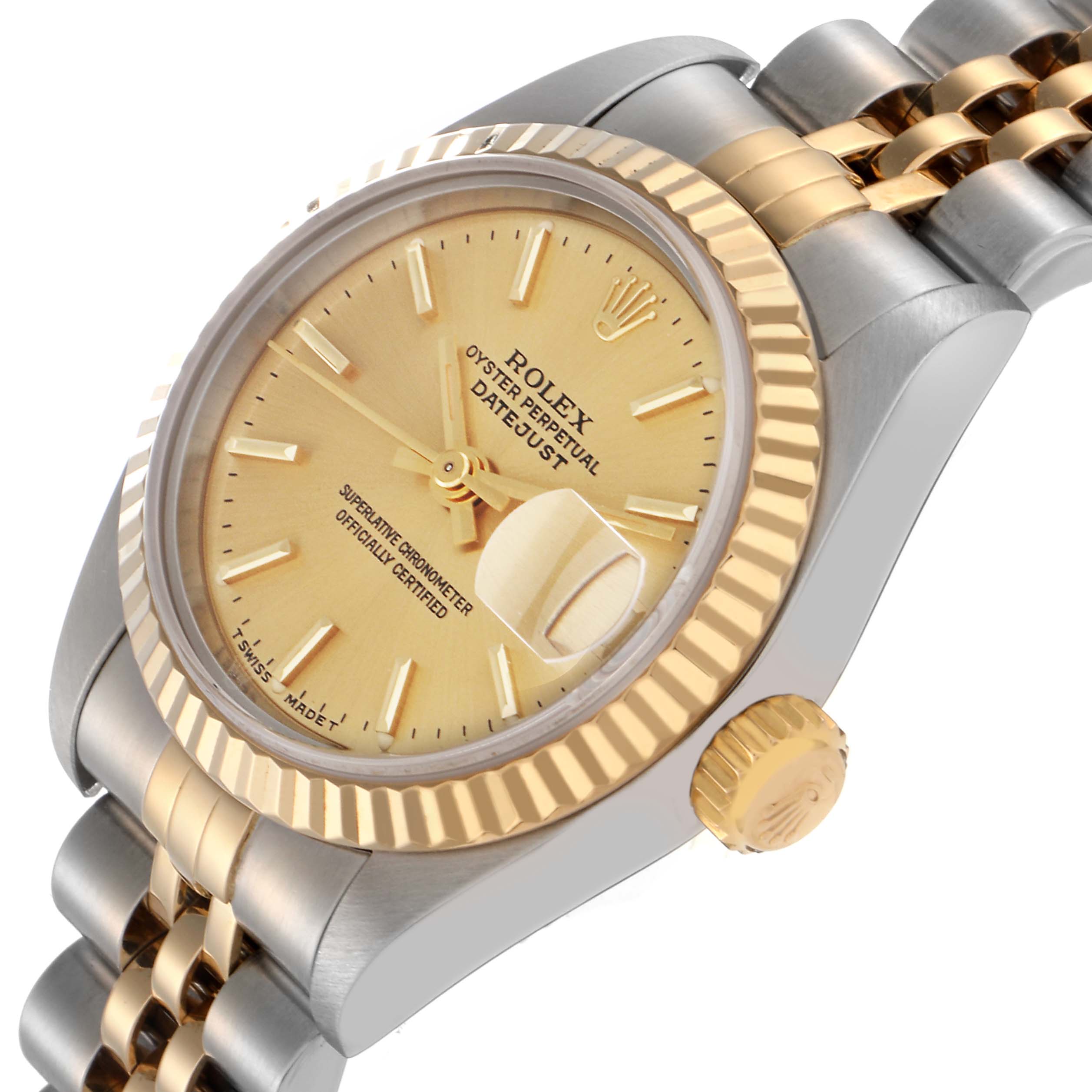 The Rolex Datejust 79173 Women
s Steel and Gold (two tone) Champagne Dial 79173 Women
s Steel and Gold (two tone) Champagne Dial watch is shown at an oblique angle highlighting the face, fluted bezel, crown, and Jubilee bracelet.