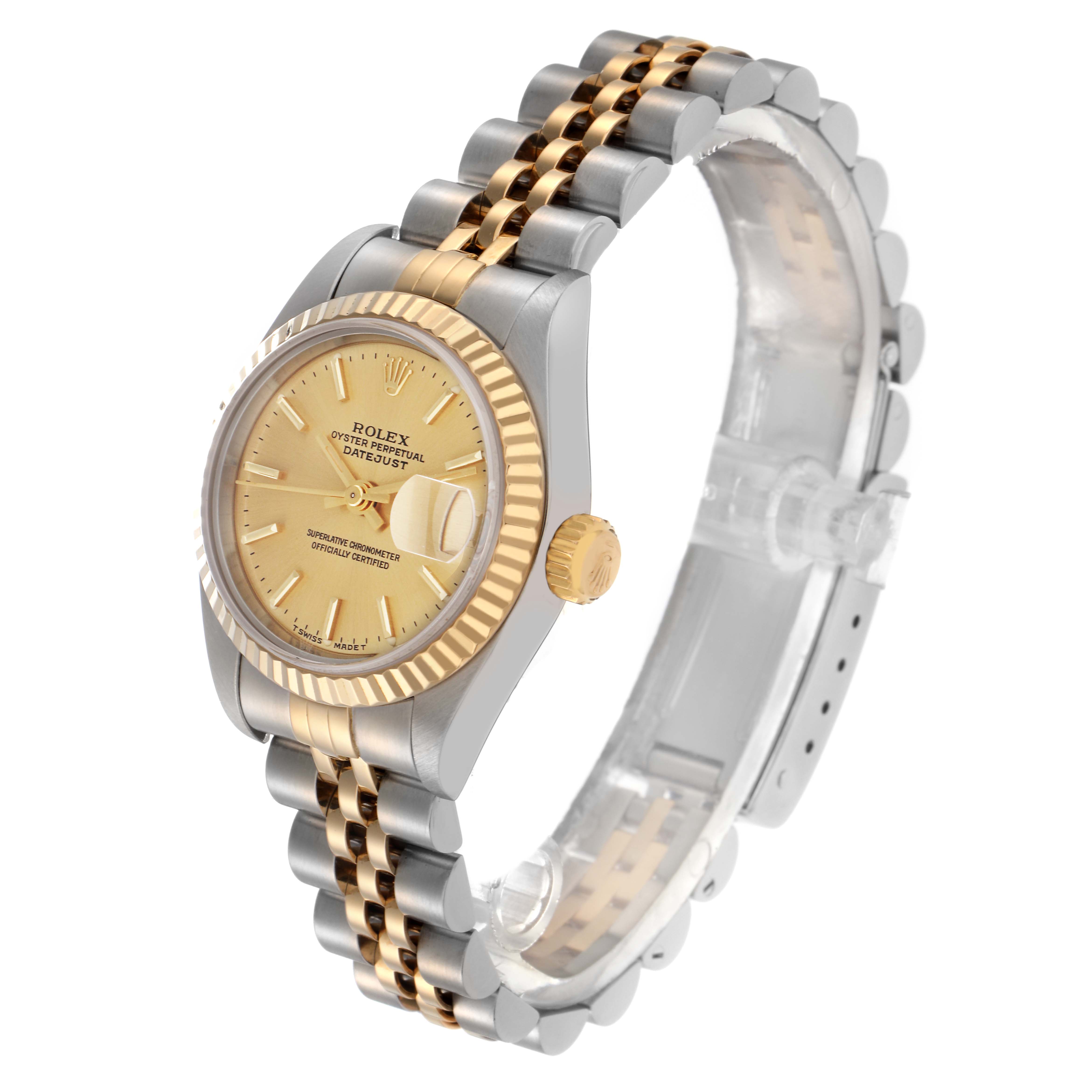 The Rolex Datejust 79173 Women
s Steel and Gold (two tone) Champagne Dial 79173 Women
s Steel and Gold (two tone) Champagne Dial watch is shown at an angle highlighting the dial, fluted bezel, and two-tone bracelet.
