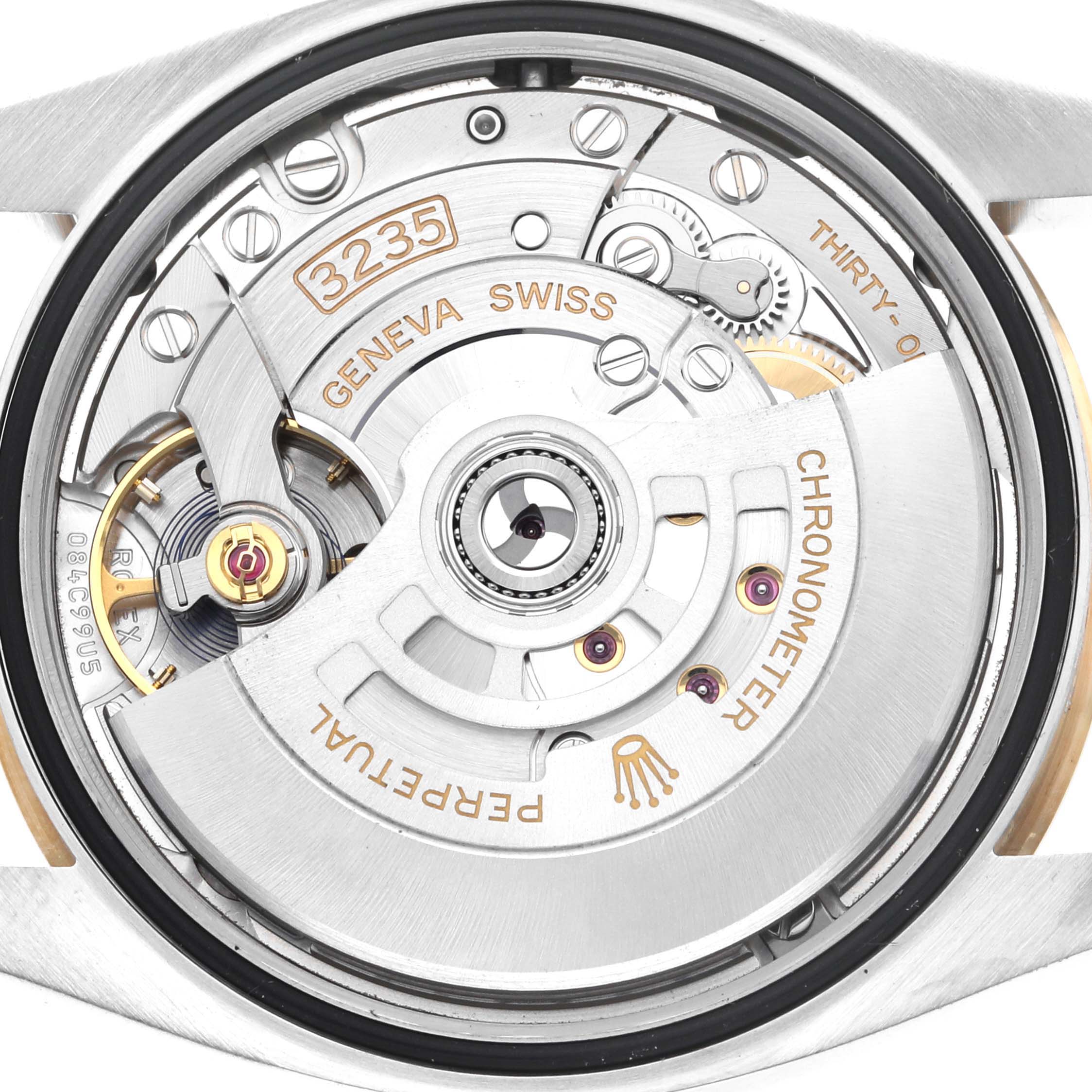 The image shows the rear view of a Rolex Datejust 126203 Men's Steel and Gold (two tone) Champagne Dial 126203 Men's Steel and Gold (two tone) Champagne Dial watch, focusing on its exposed movement and internal mechanisms.