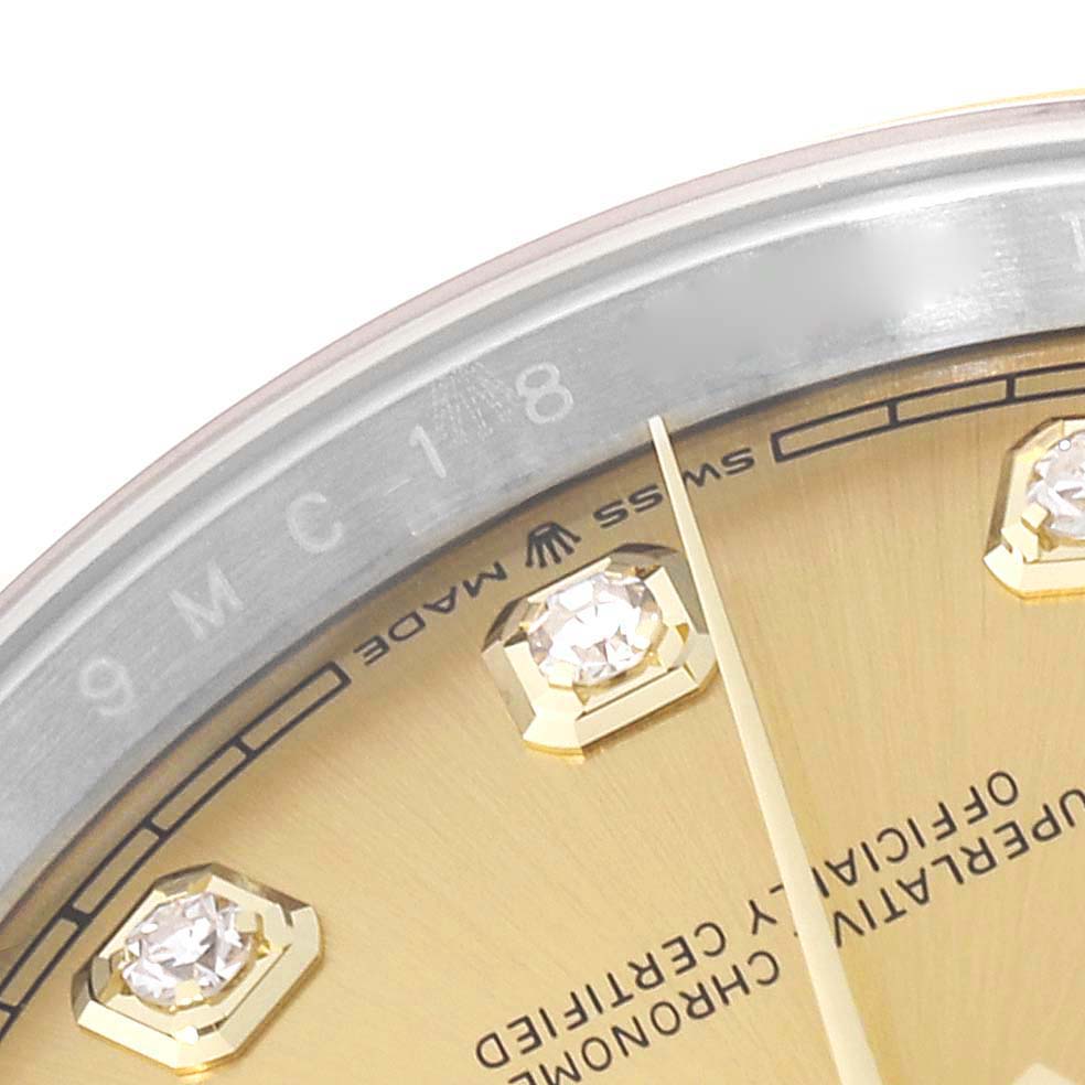 The image shows a close-up view of the dial and bezel of the Rolex Datejust 126203 Men's Steel and Gold (two tone) Champagne Dial 126203 Men's Steel and Gold (two tone) Champagne Dial watch, highlighting diamond hour markers and the "Swiss Made" text.