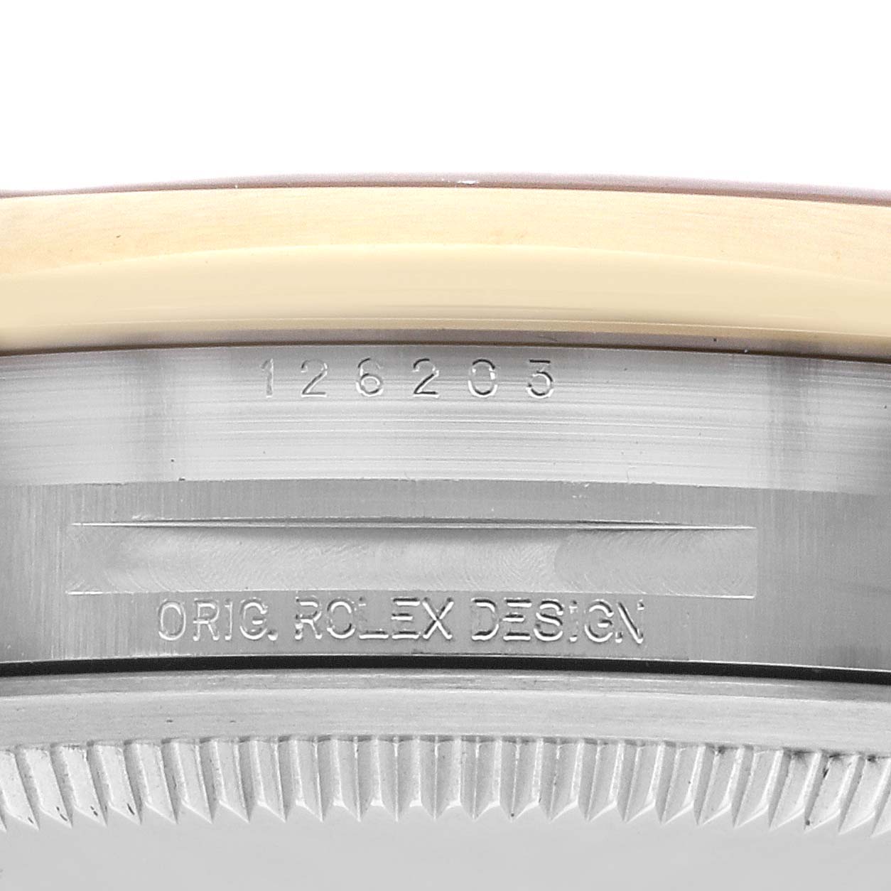 This image shows the side view of the case and the serial number of a Rolex Datejust 126203 Men's Steel and Gold (two tone) Champagne Dial 126203 Men's Steel and Gold (two tone) Champagne Dial watch.