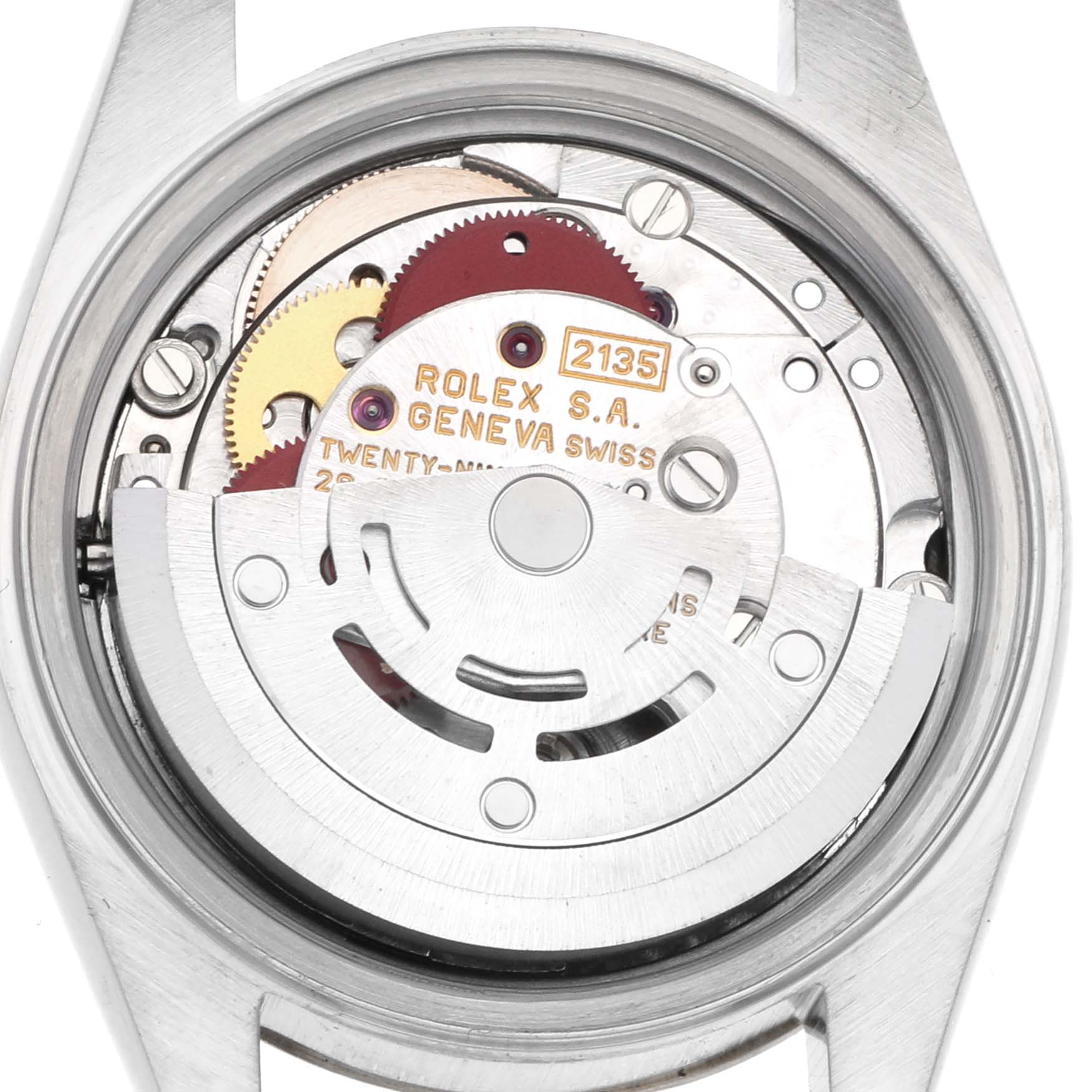 The image shows the movement of a Rolex Datejust 69173 Women
s Steel and Gold (two tone) Champagne Dial 69173 Women
s Steel and Gold (two tone) Champagne Dial watch, viewed from the back, highlighting its intricate gears and rotor.