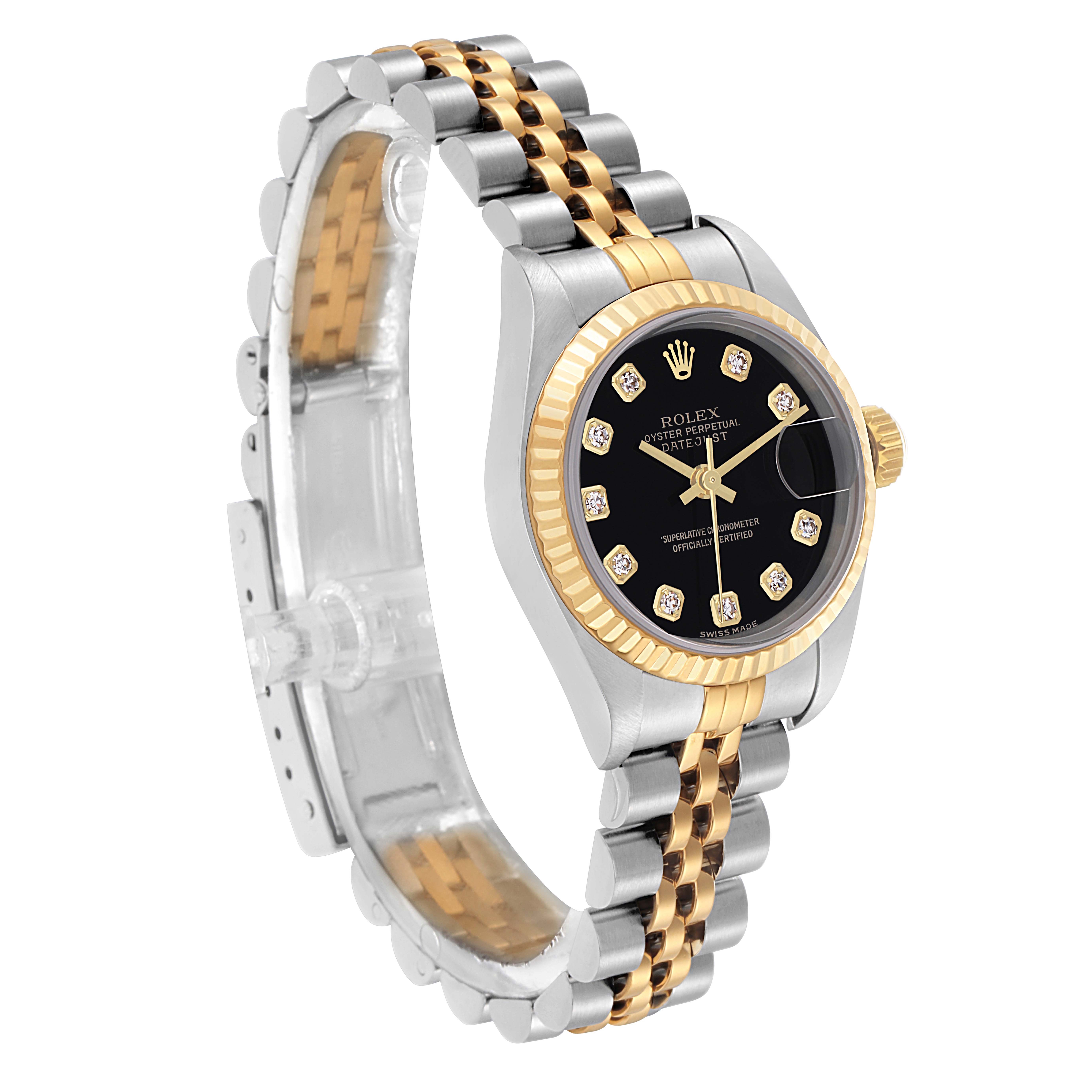 The Rolex Datejust 79173 Women
s Steel and Gold (two tone) Black Dial 79173 Women
s Steel and Gold (two tone) Black Dial watch is shown at a slight angle, highlighting its two-tone bracelet and black diamond-accented dial.